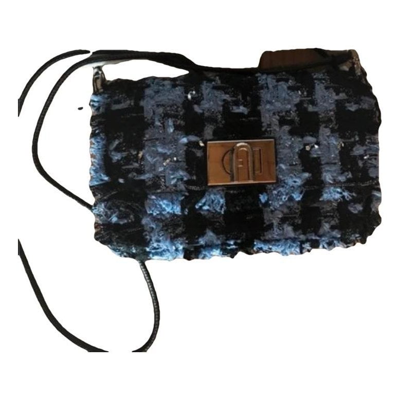 Metropolis tweed clutch bag