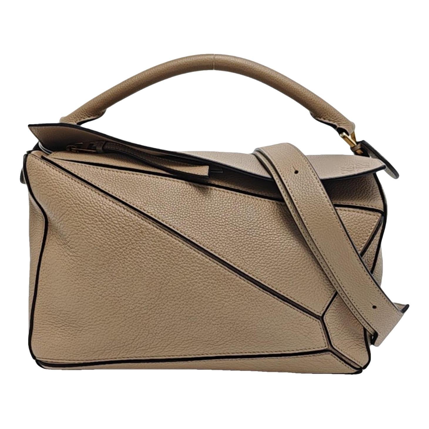 Puzzle leather handbag