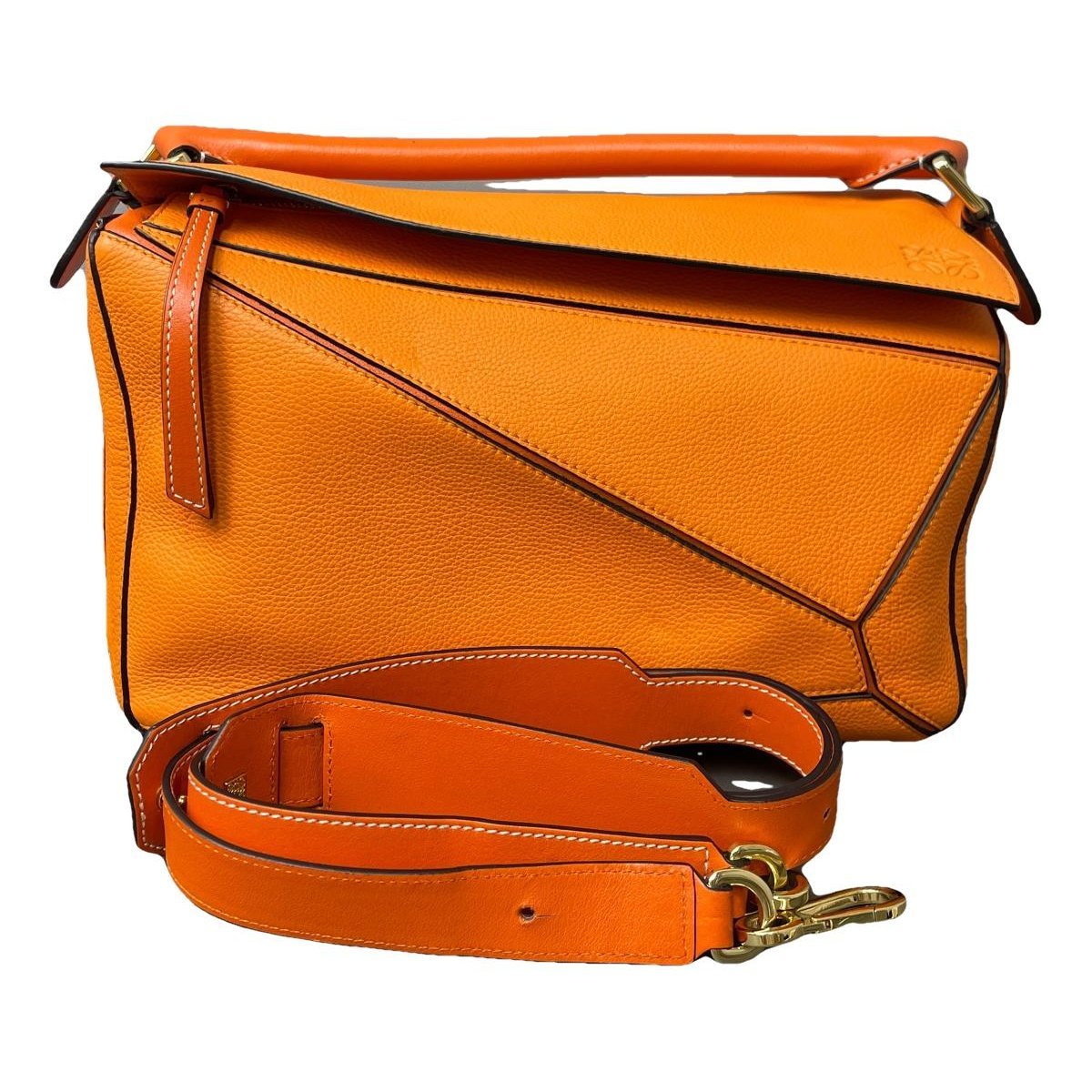 Puzzle leather handbag