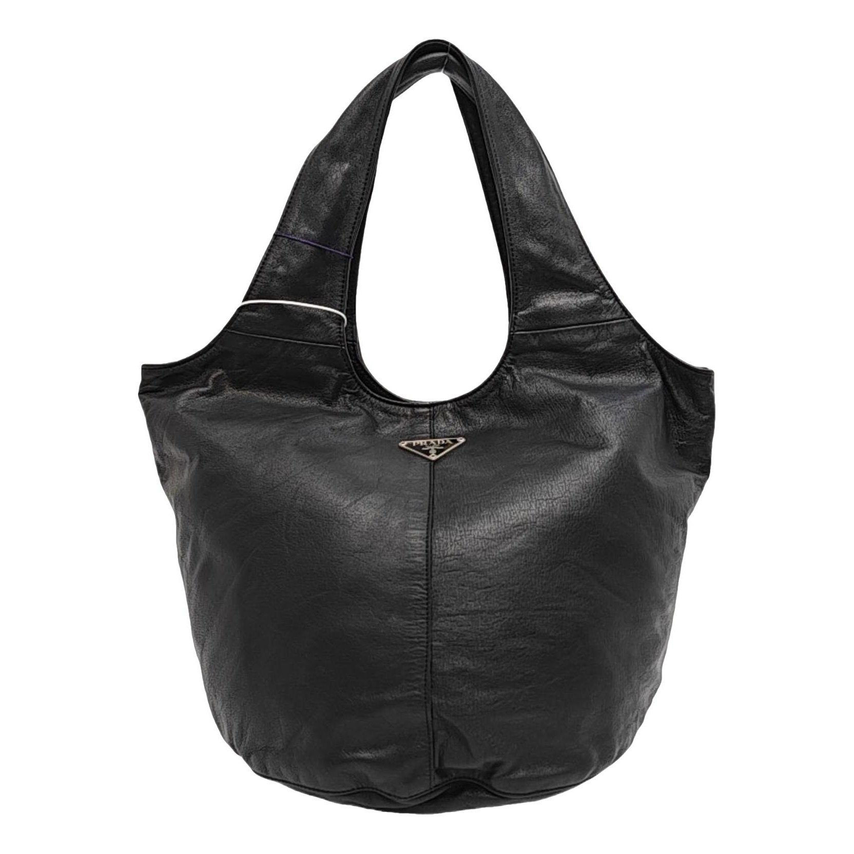 Arqué leather handbag