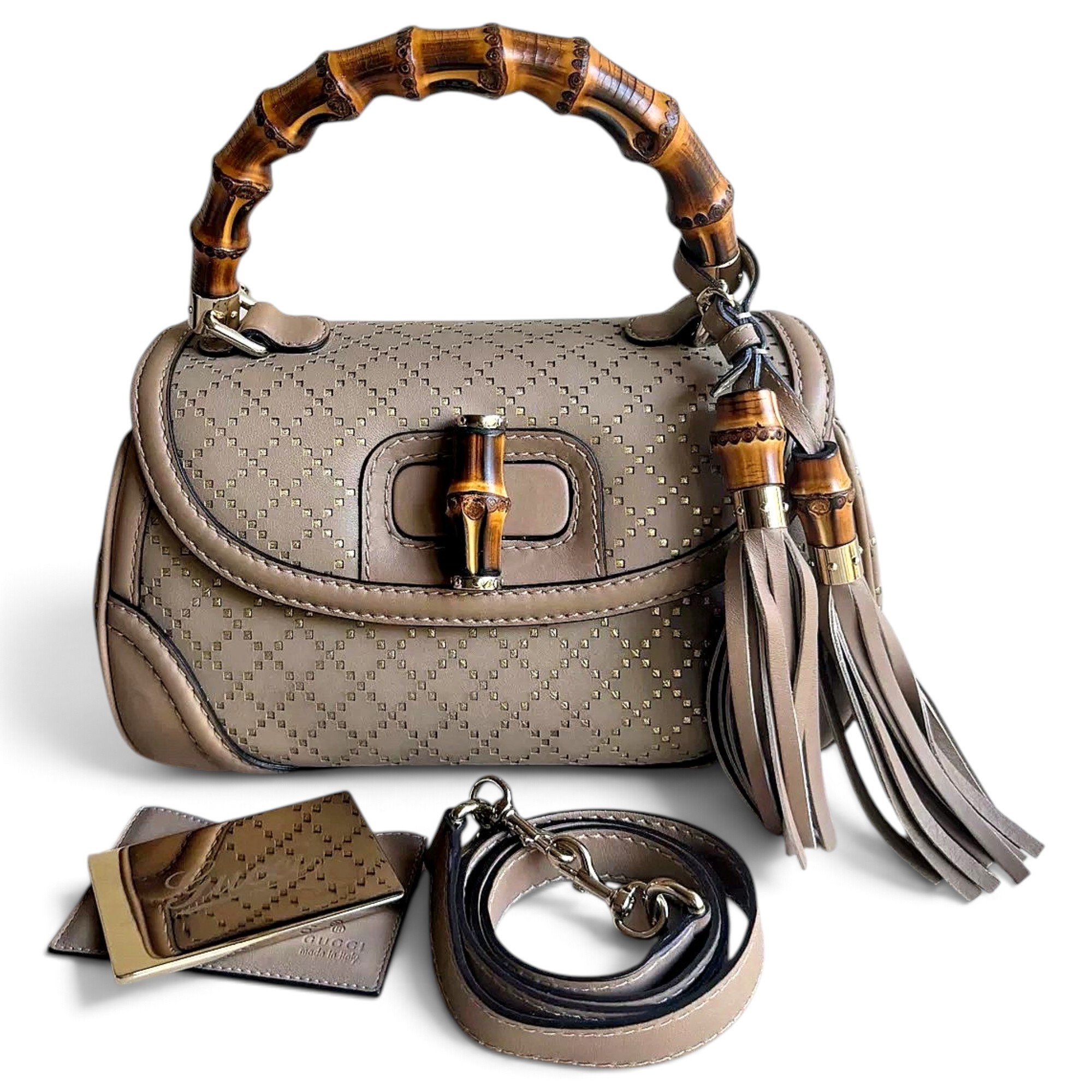 Convertible Pompon Bamboo Top Handle leather handbag