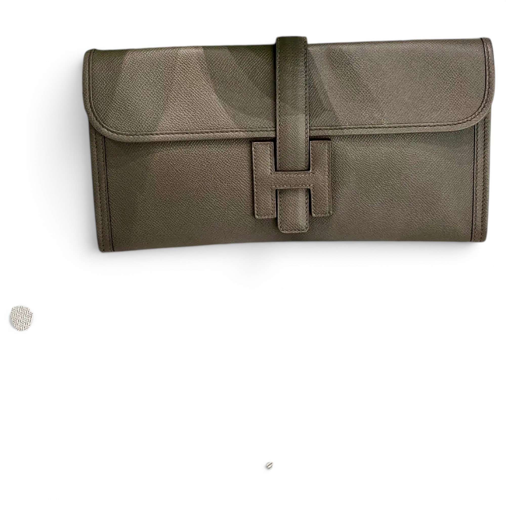 Jige leather clutch bag