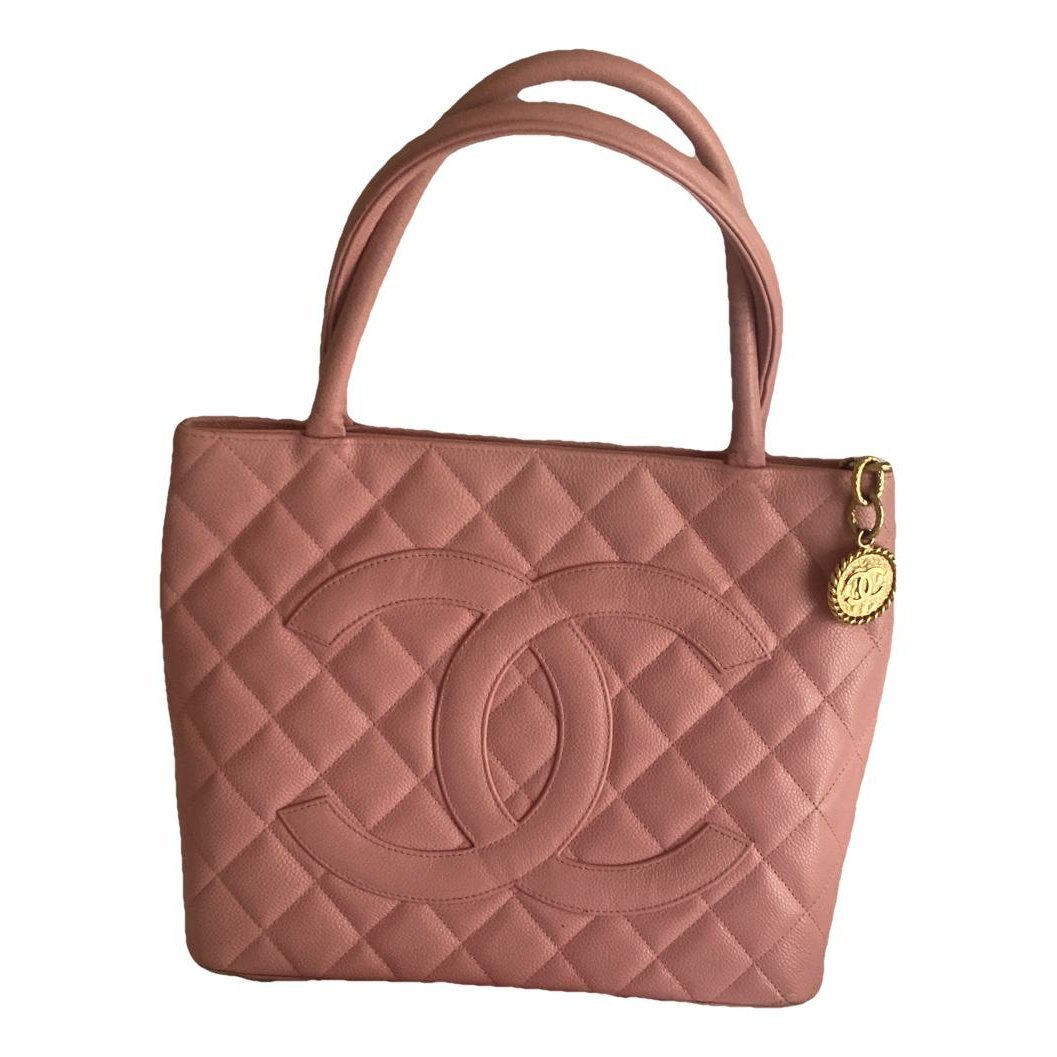 Médaillon leather handbag
