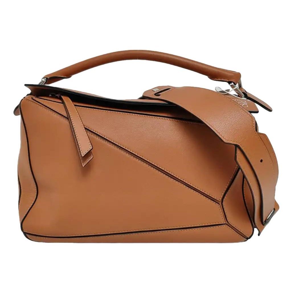 Puzzle leather handbag
