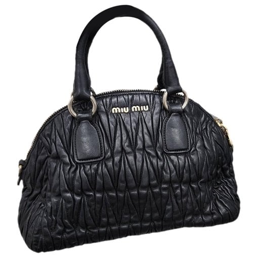 Matelassé leather handbag