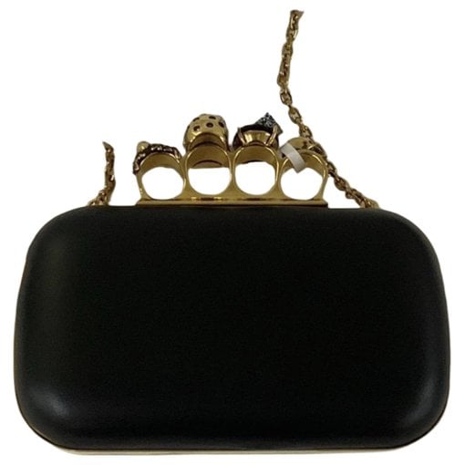 Knuckle leather clutch bag