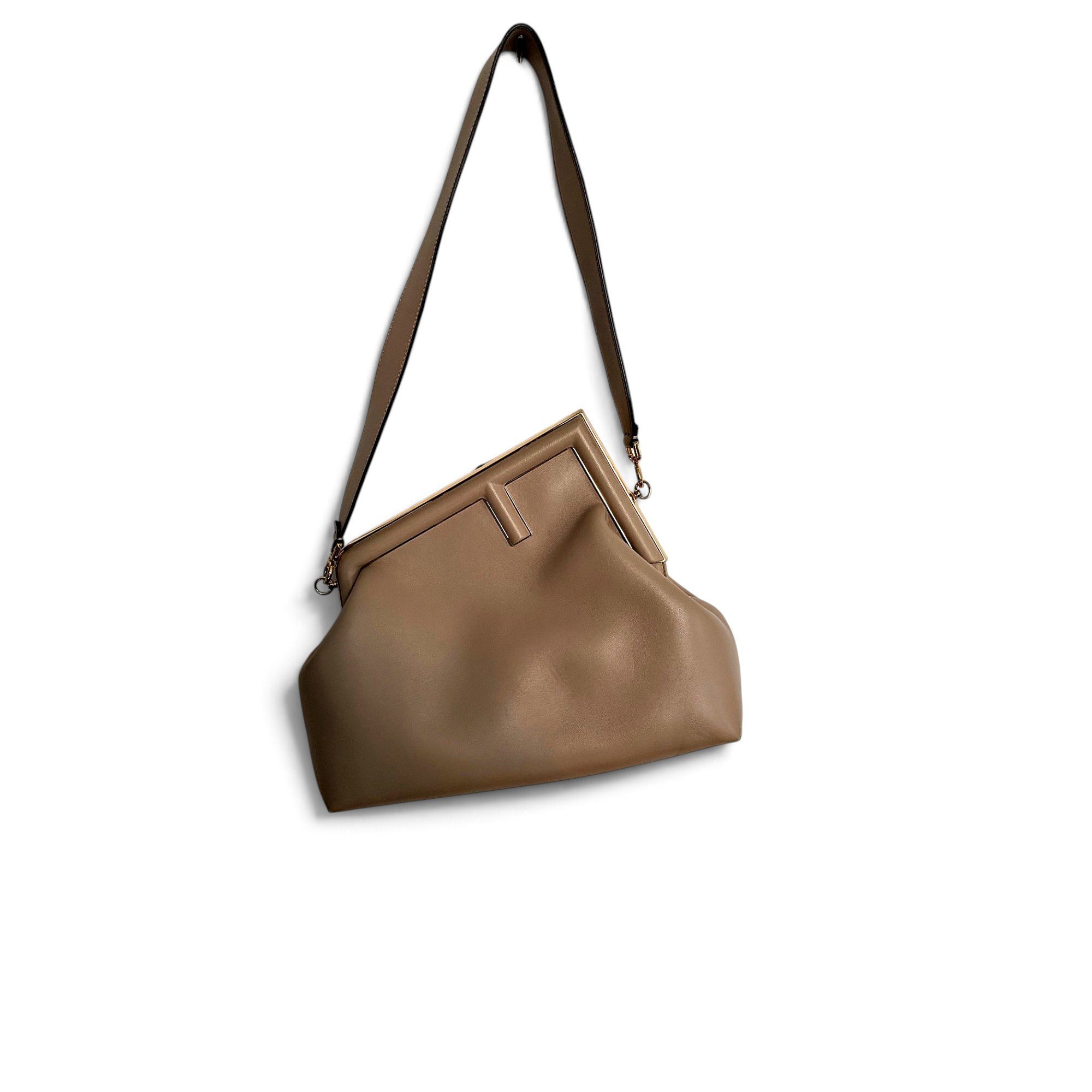 First leather handbag