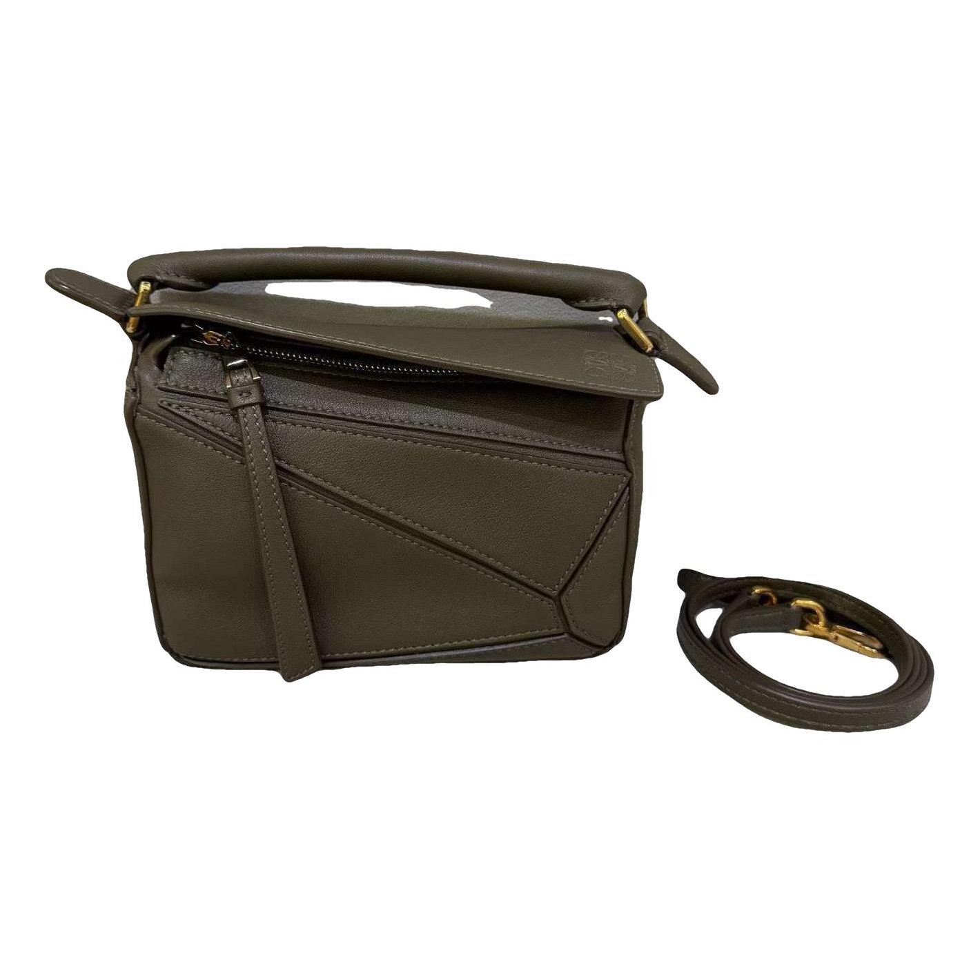 Puzzle leather handbag