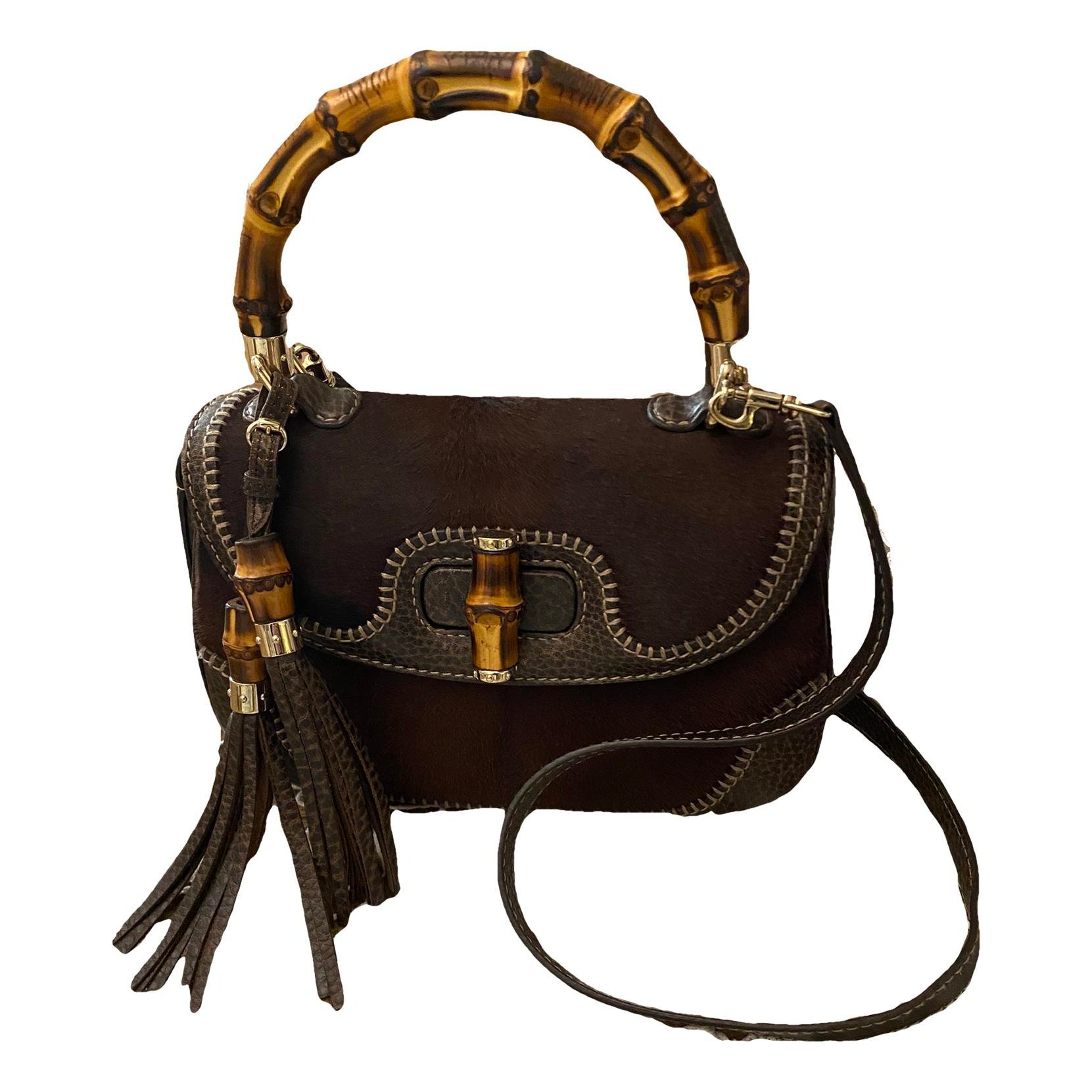 Gucci Convertible Pompon Bamboo Top Handle pony-style calfskin handbag