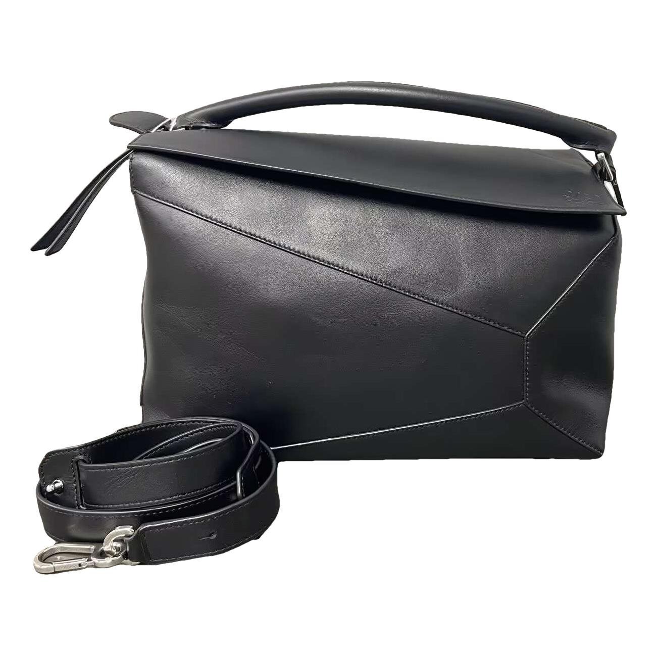 Puzzle leather handbag