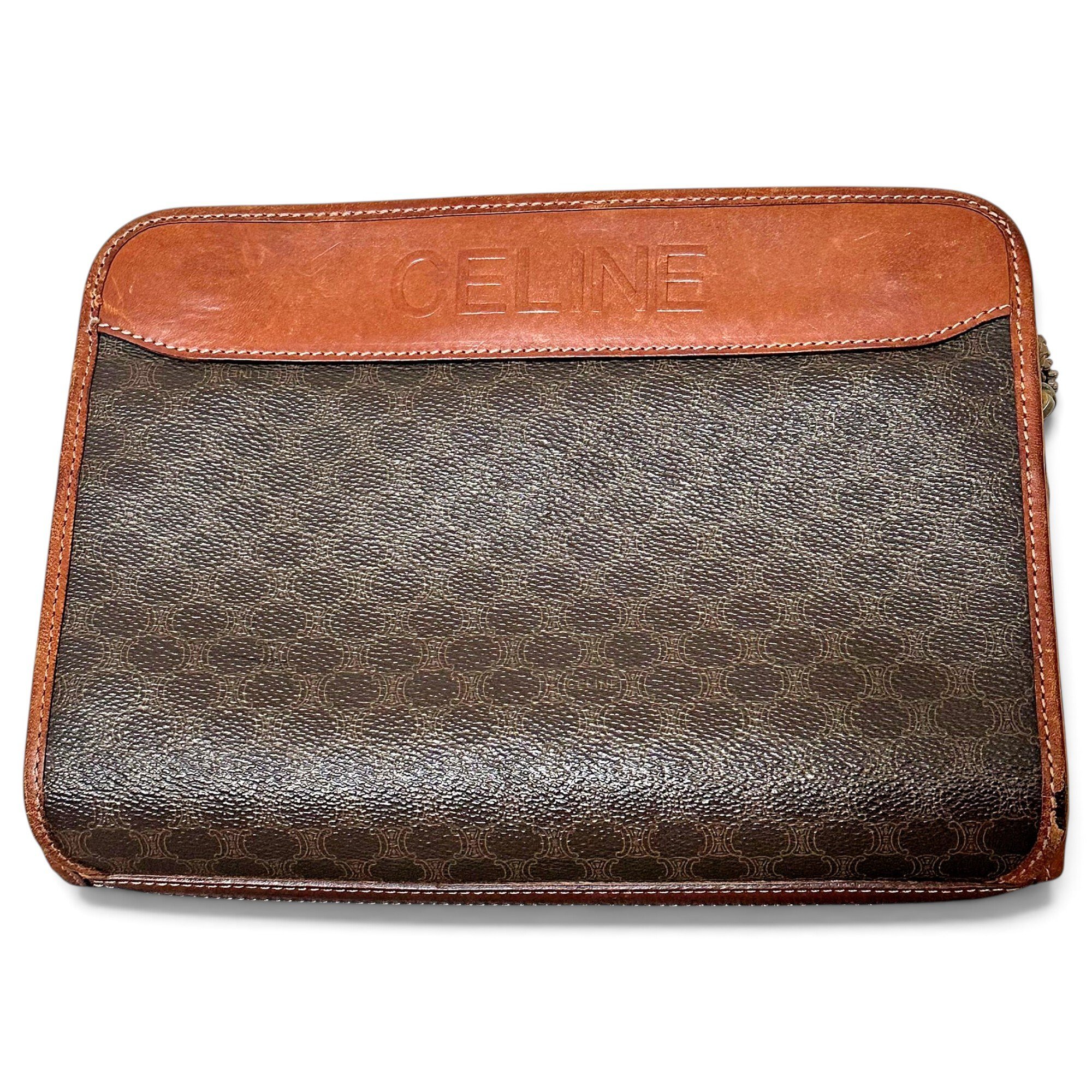 Triomphe Vintage leather clutch bag