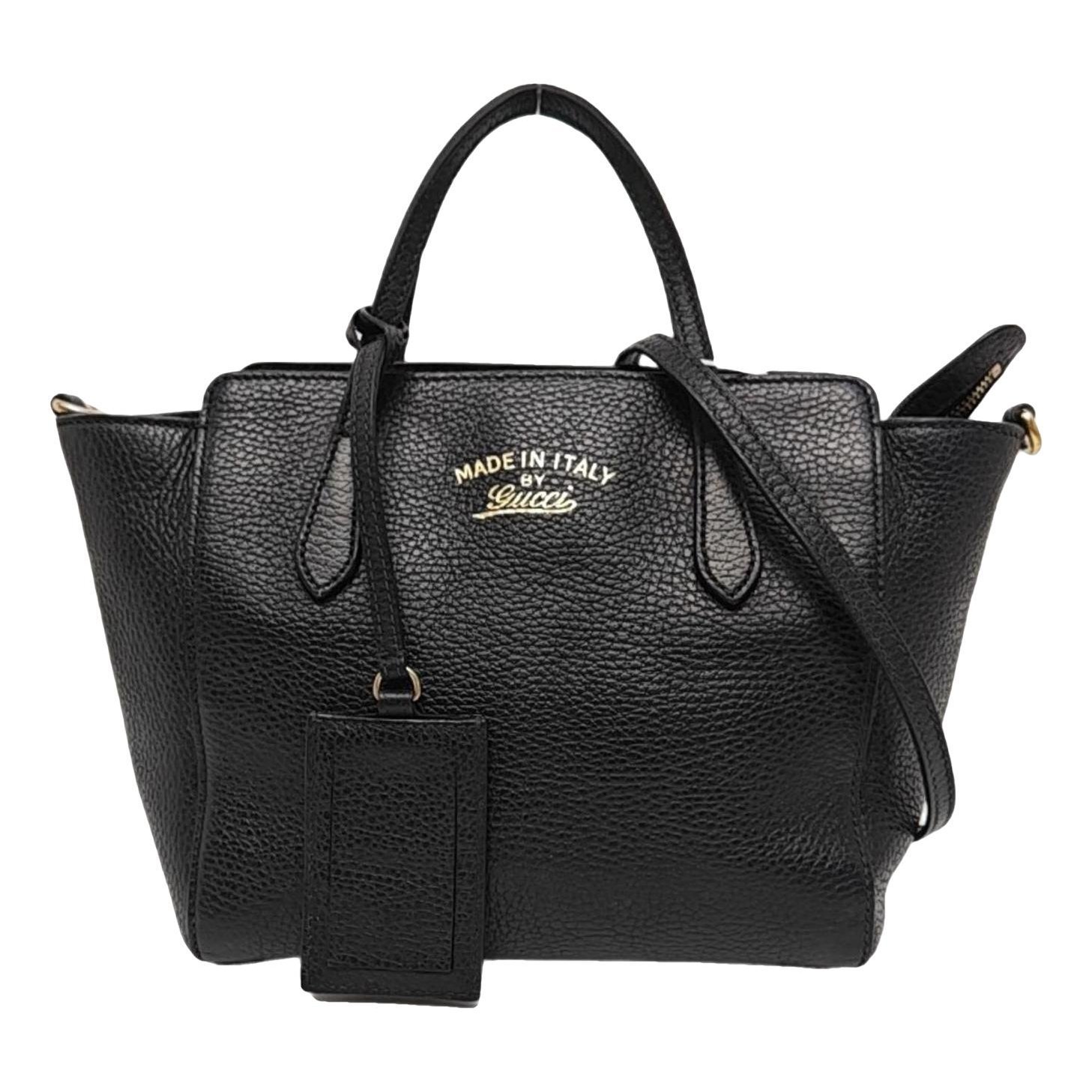 Swing leather handbag