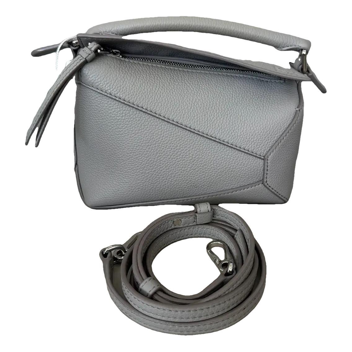 Puzzle leather crossbody bag
