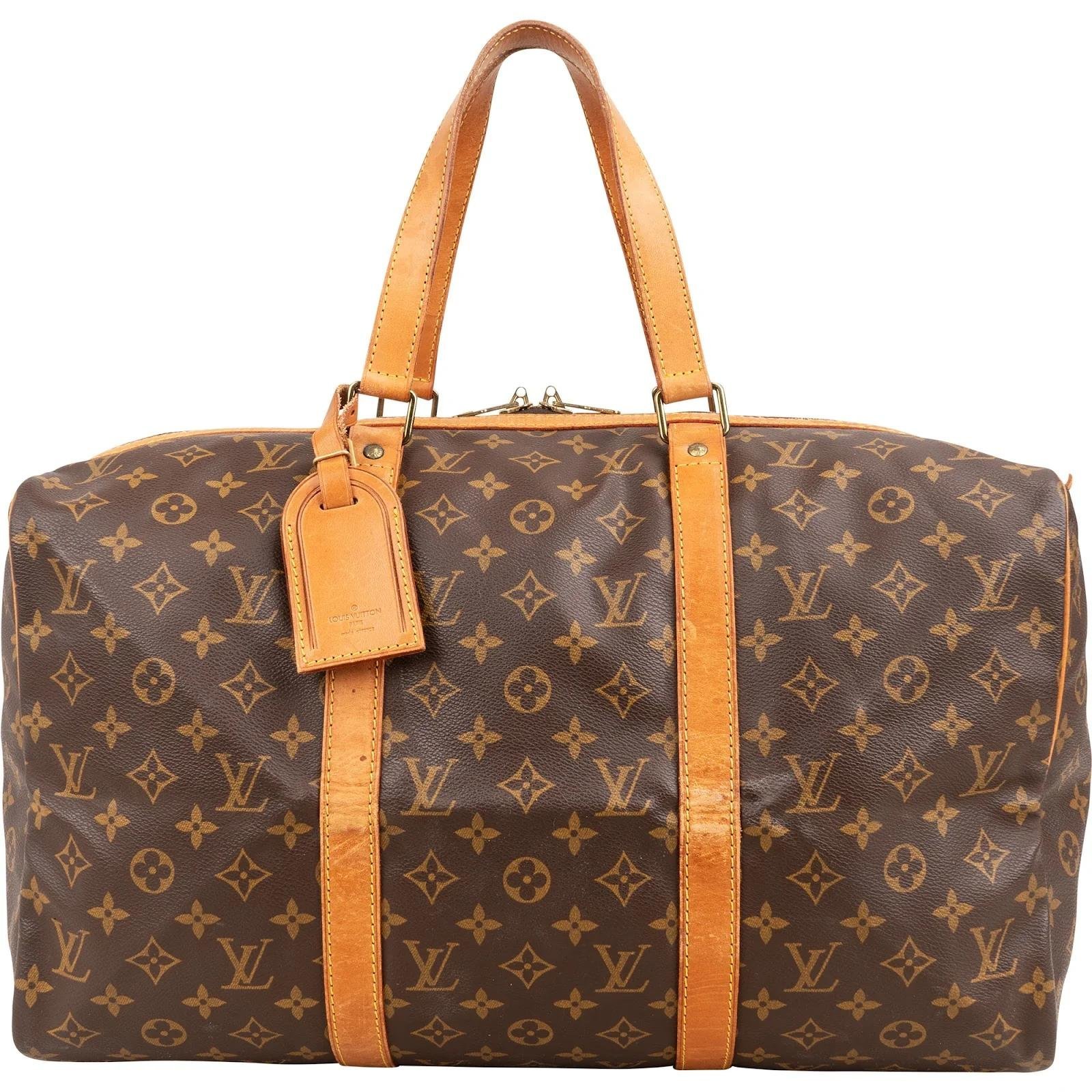 Louis Vuitton Sac souple leather travel bag