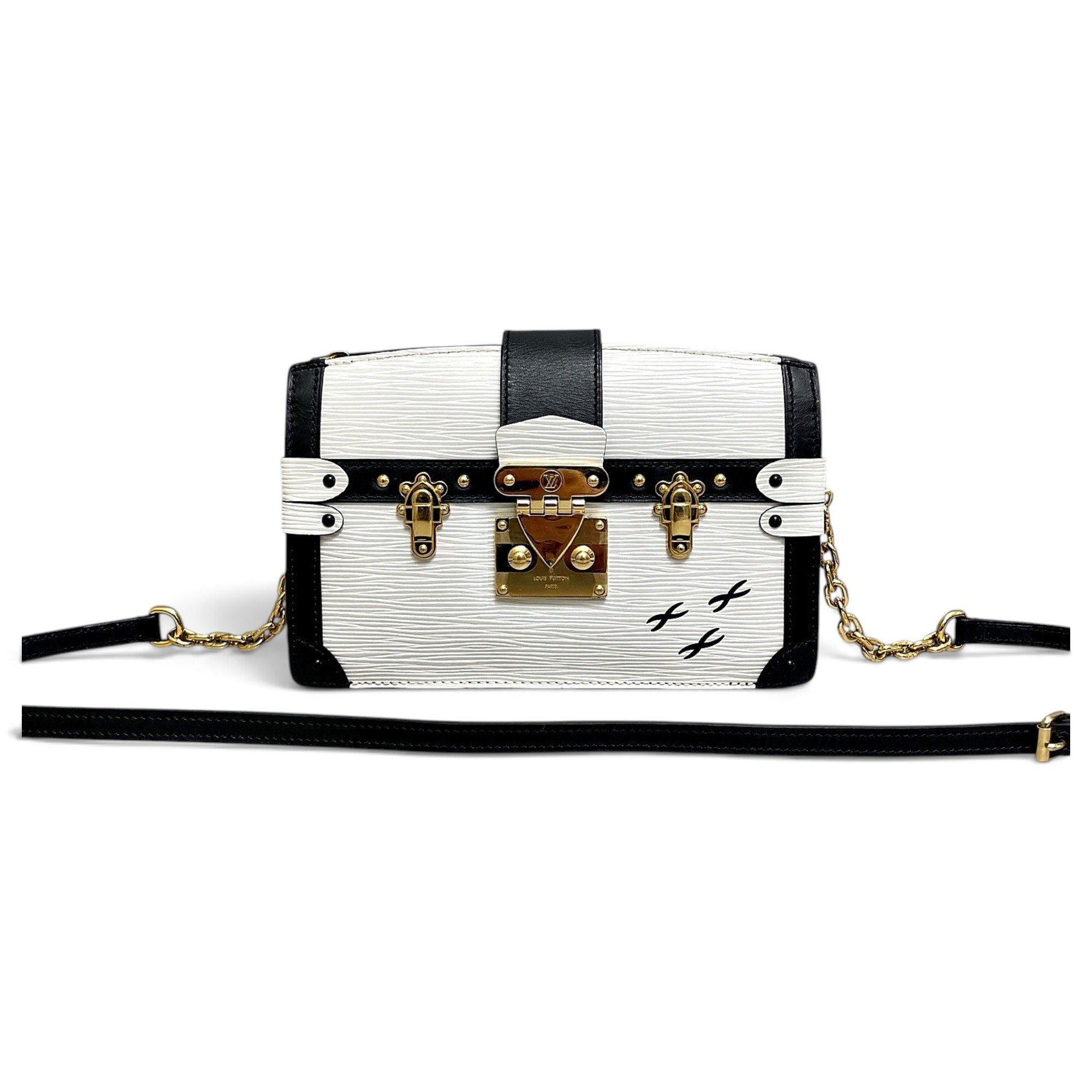 Pochette Trunk leather handbag