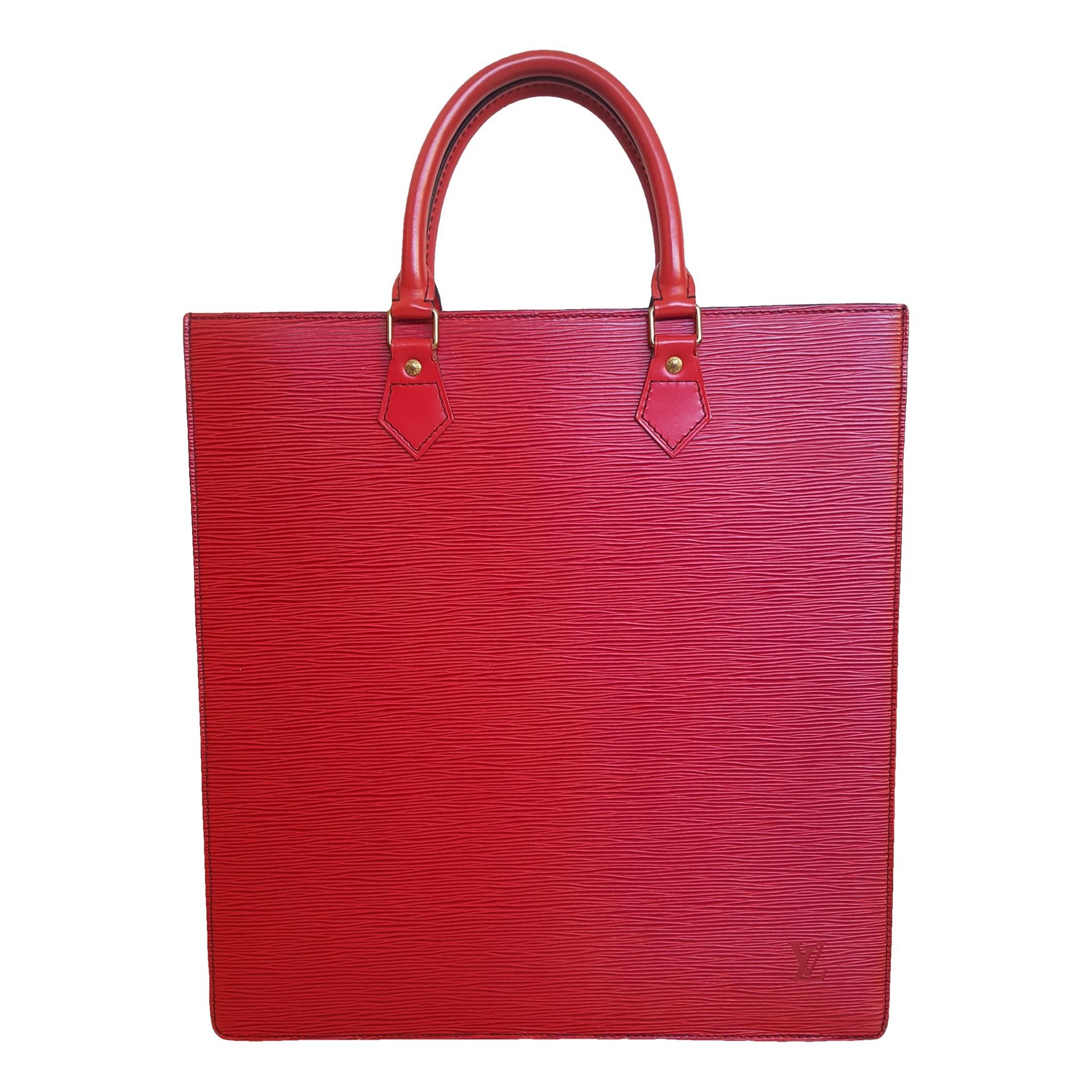 Plat patent leather handbag