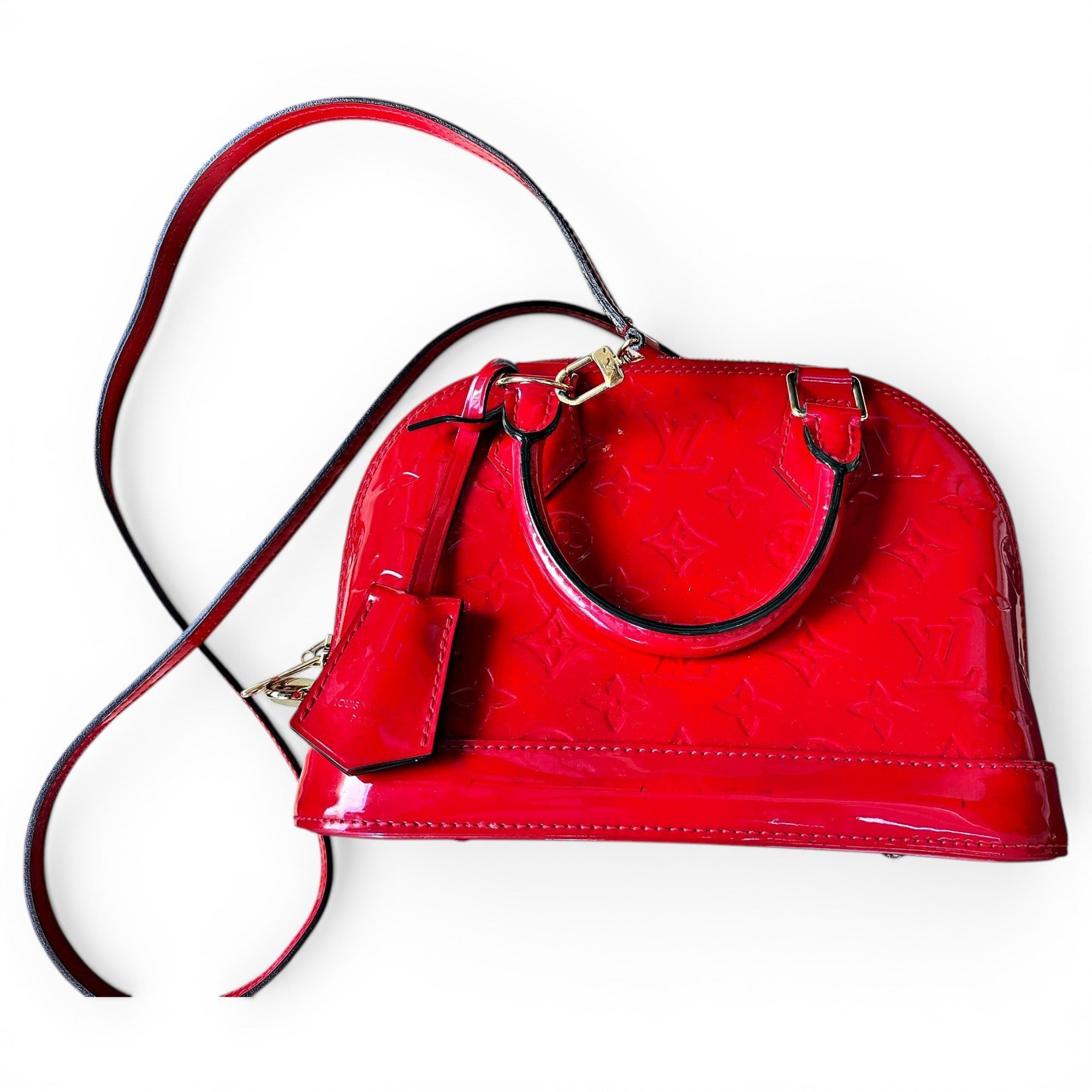Louis Vuitton Alma patent leather handbag