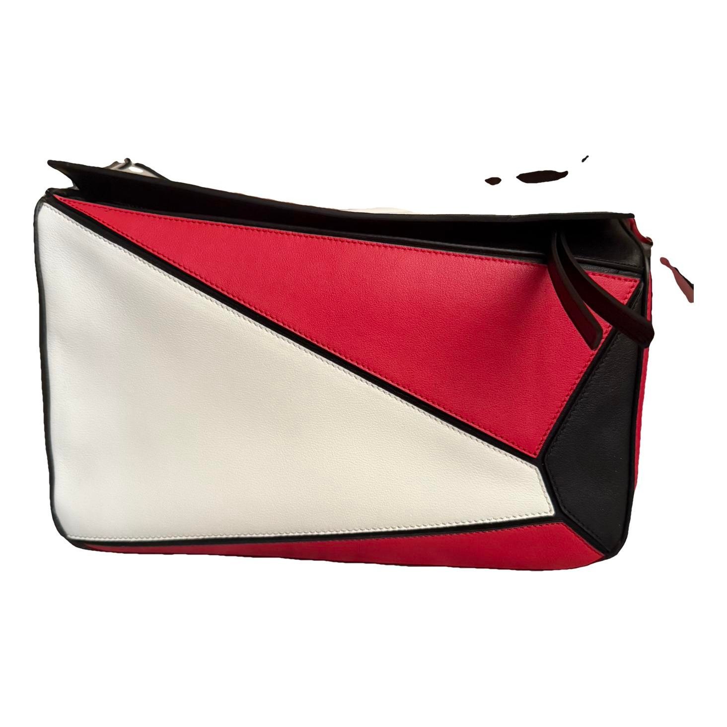 Puzzle leather handbag
