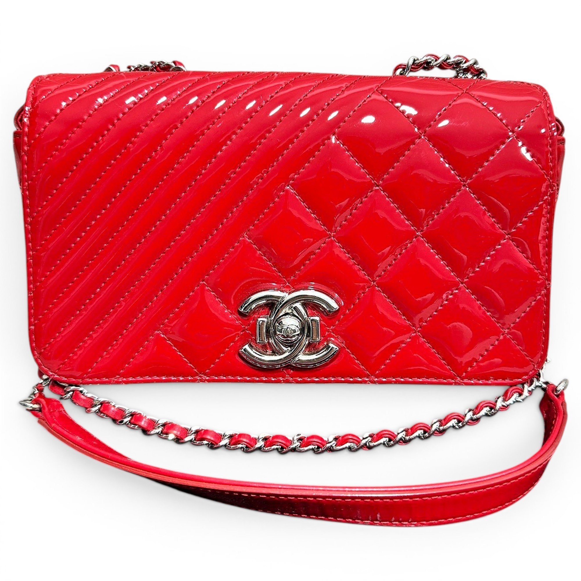 Coco boy patent leather handbag
