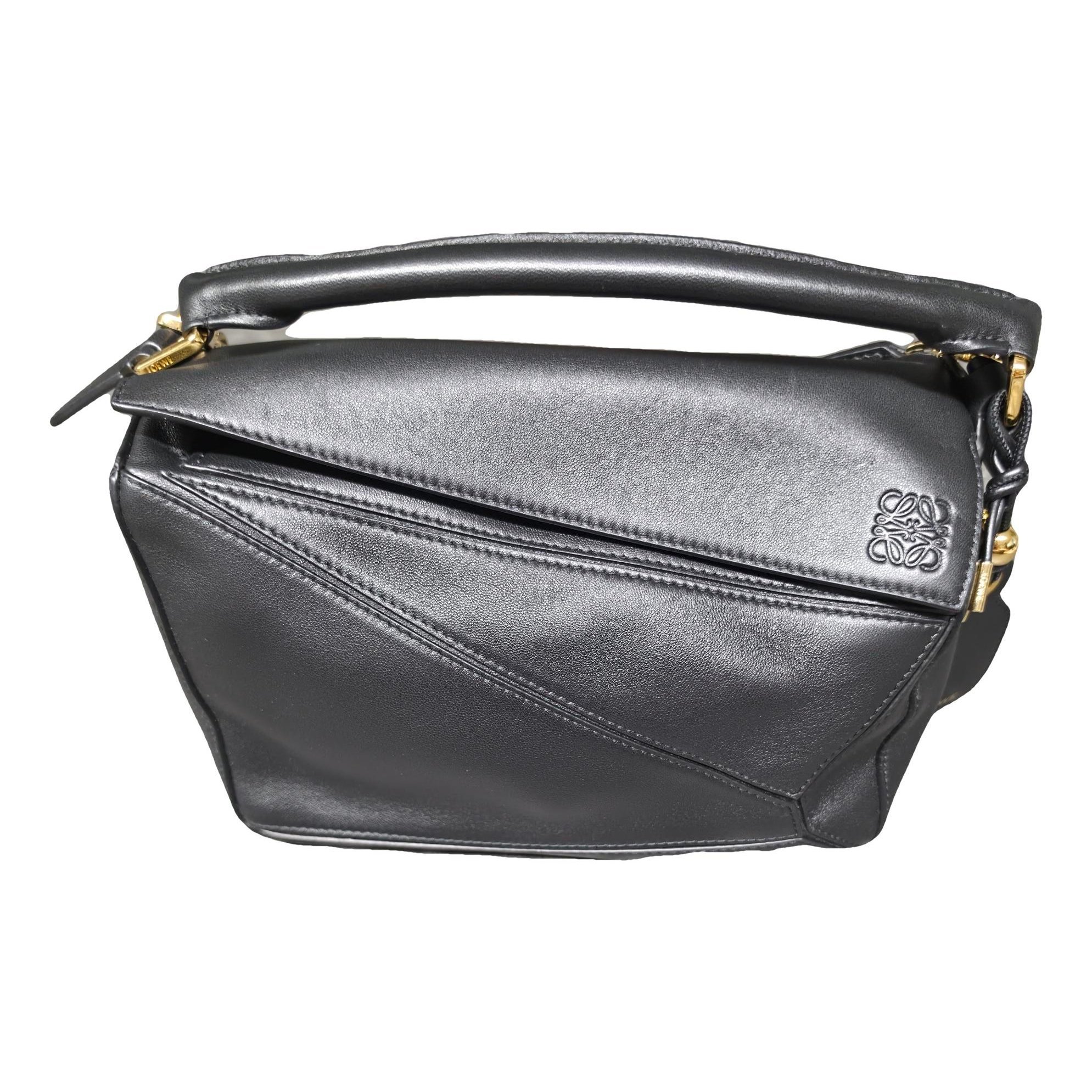 Puzzle leather handbag
