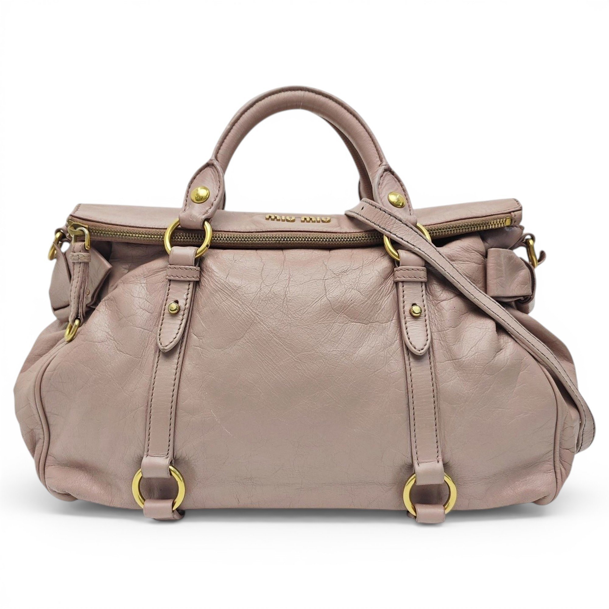 Bow bag leather handbag