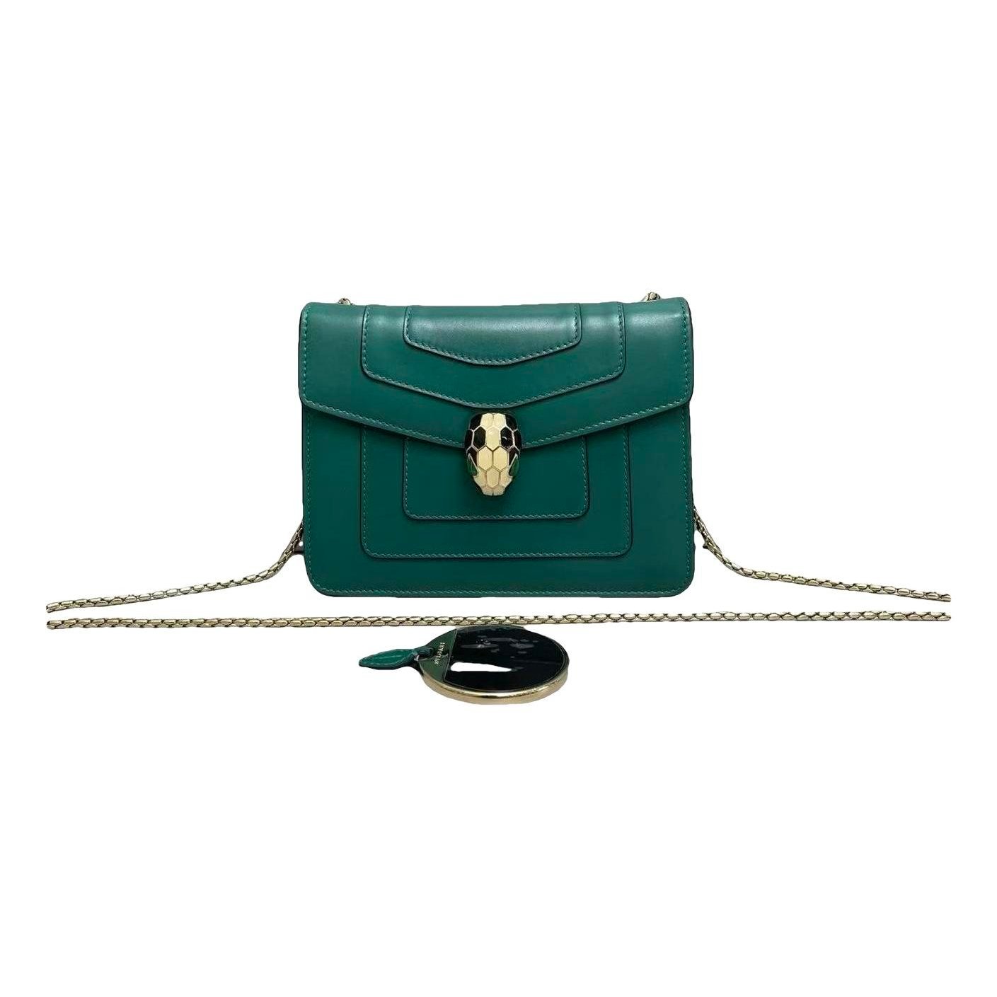 Serpenti leather handbag