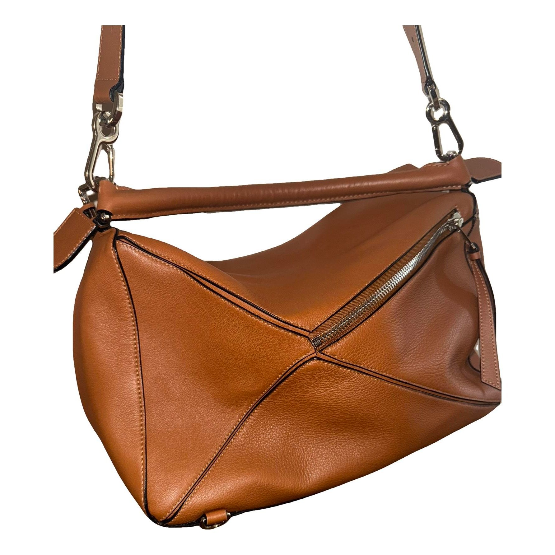 Puzzle leather clutch bag