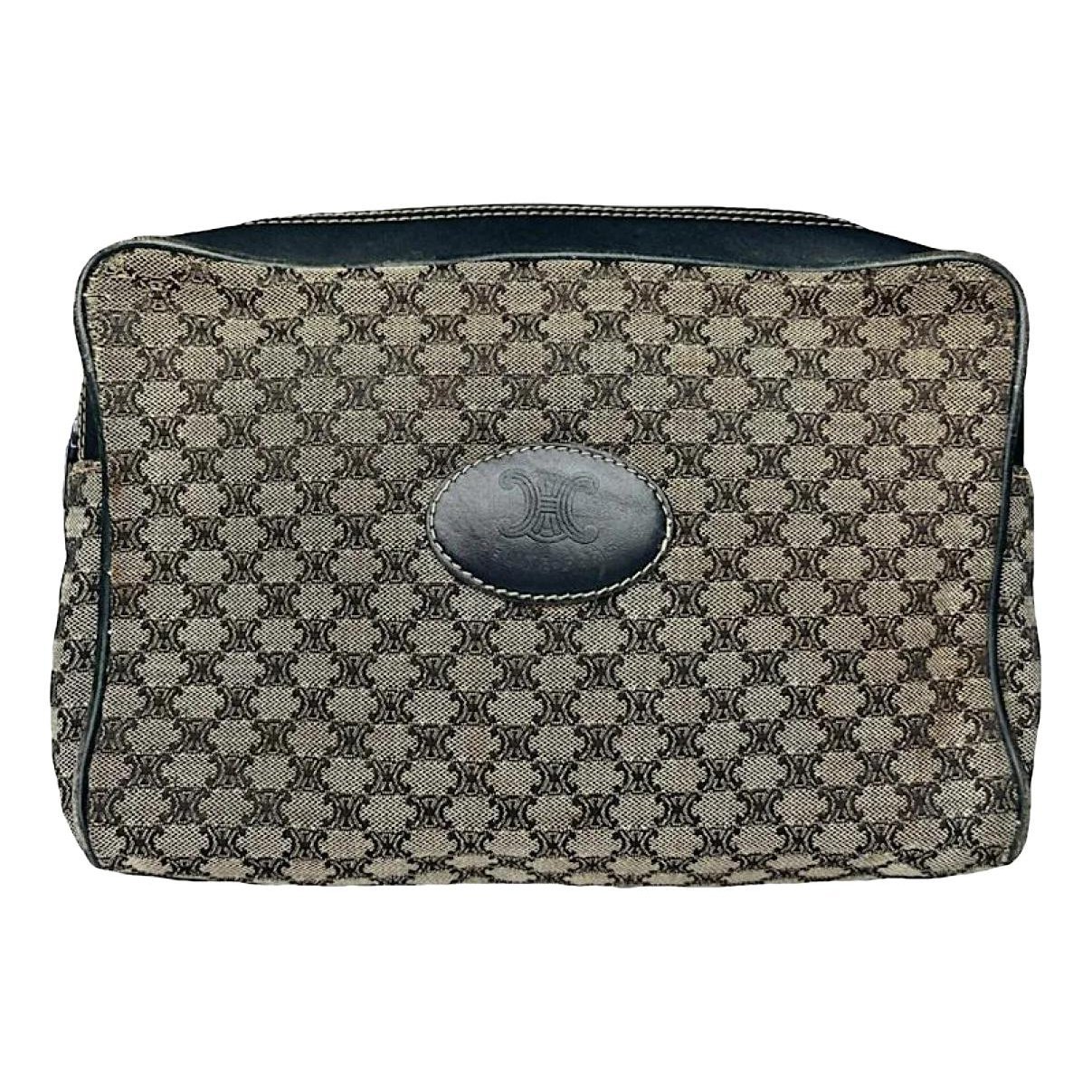 Triomphe Vintage cloth clutch bag