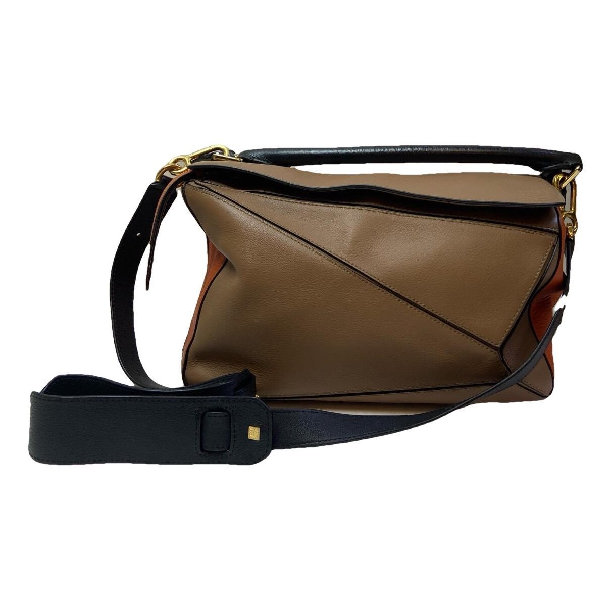 Puzzle leather handbag