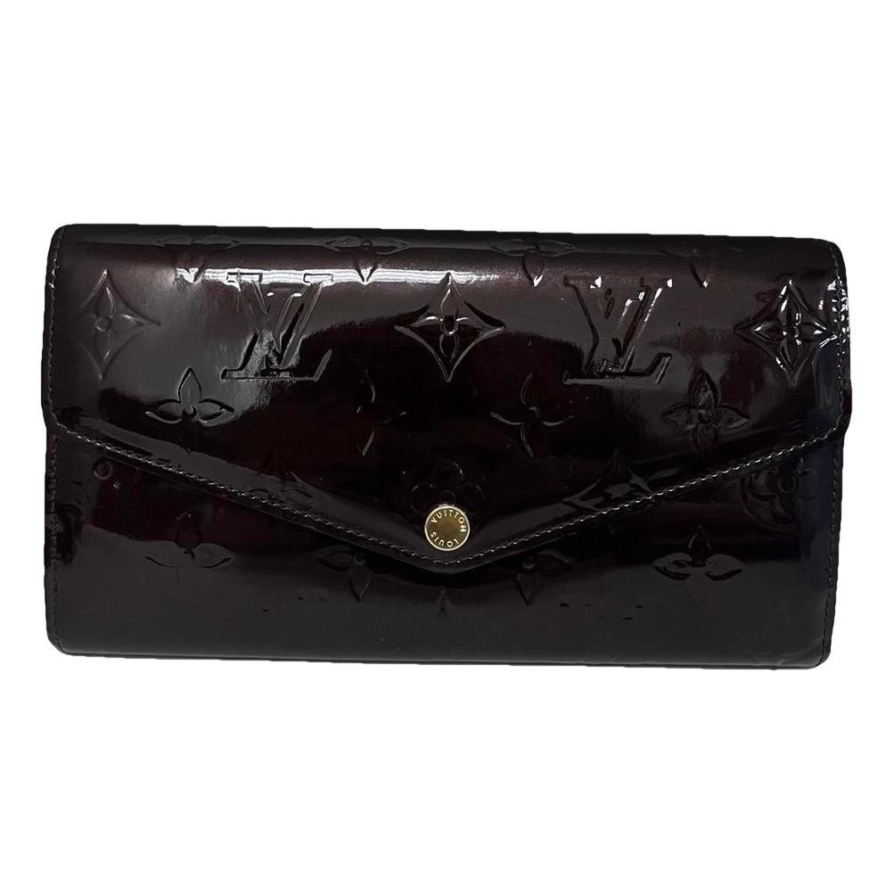Patent leather clutch bag