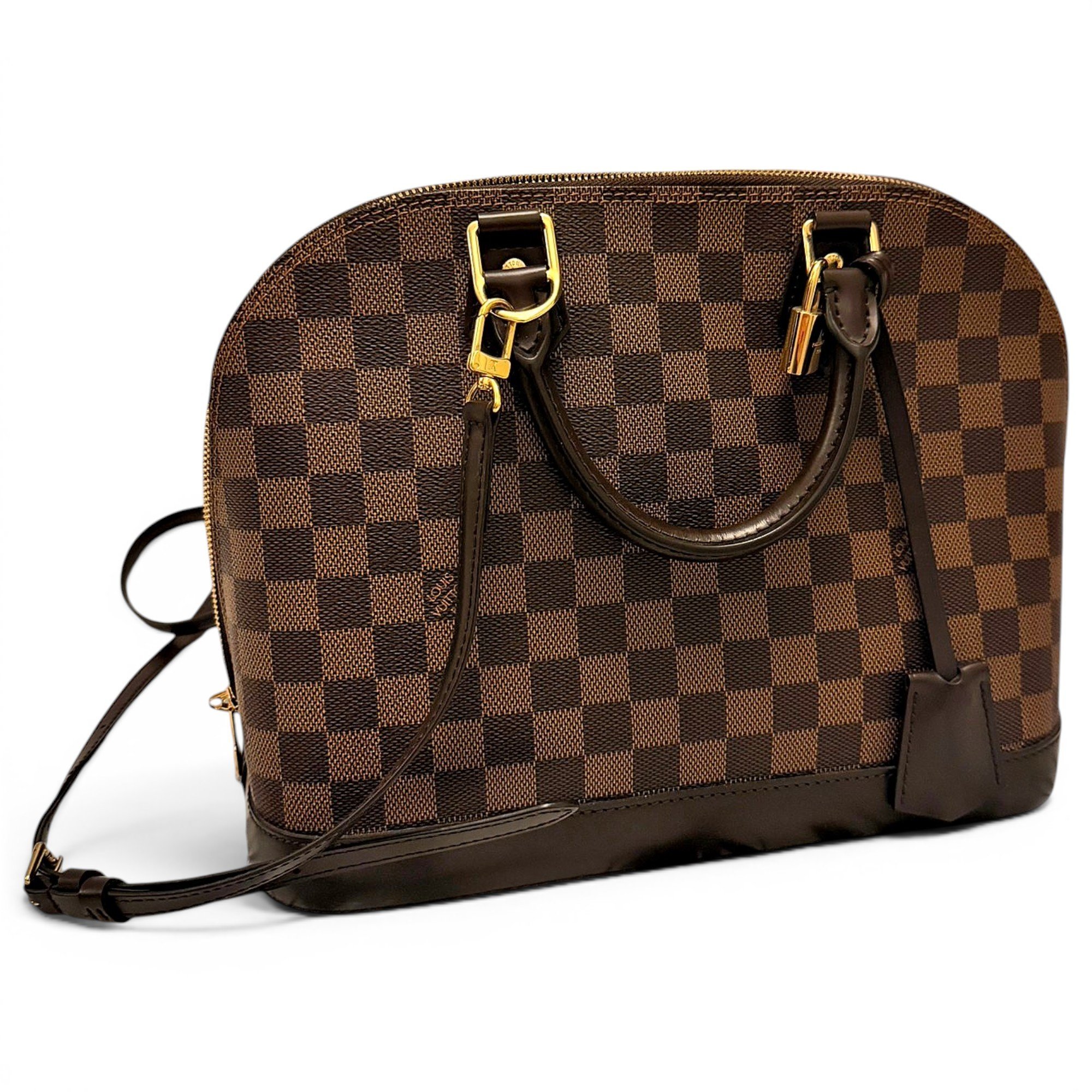 Louis Vuitton Alma cloth handbag