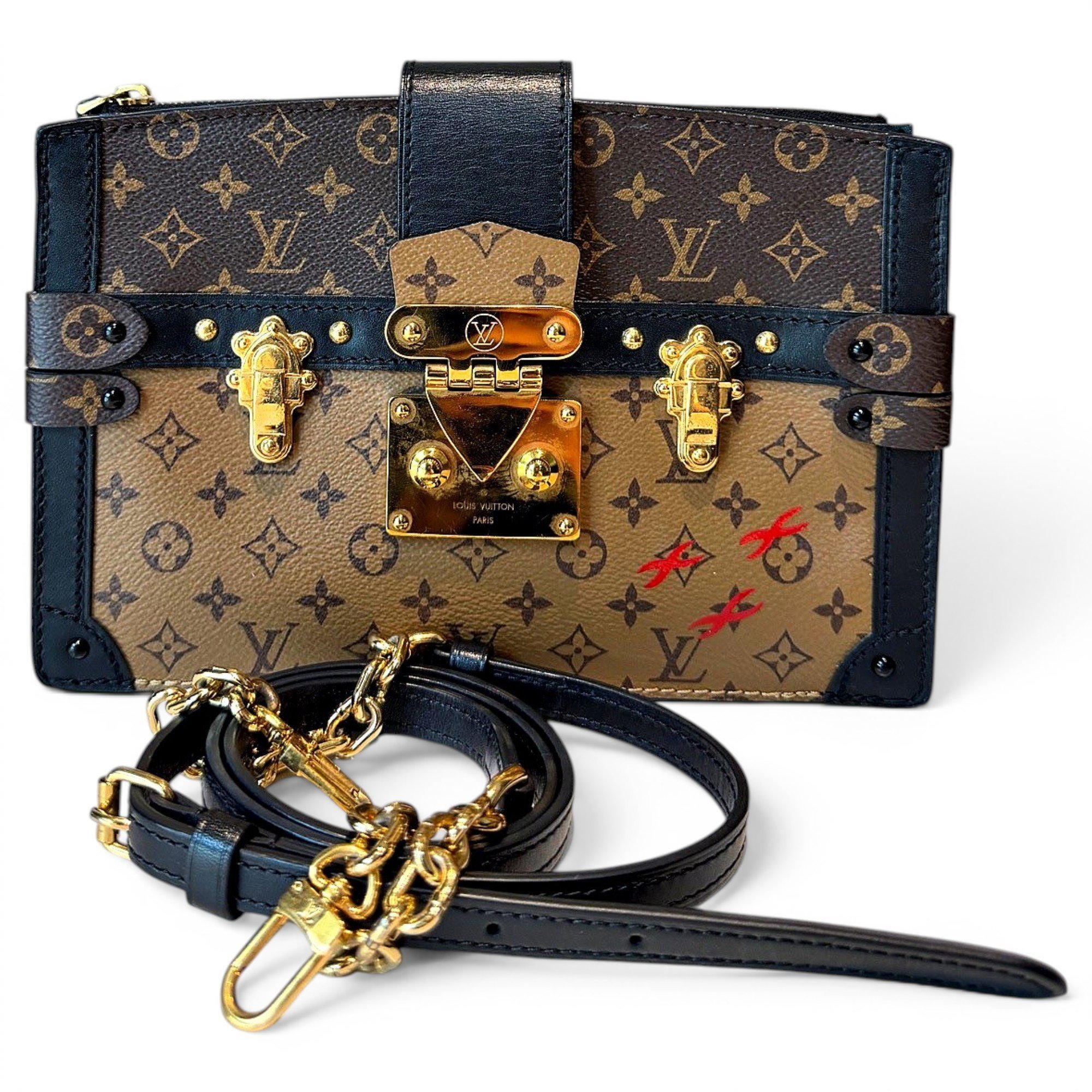 Pochette Trunk leather handbag