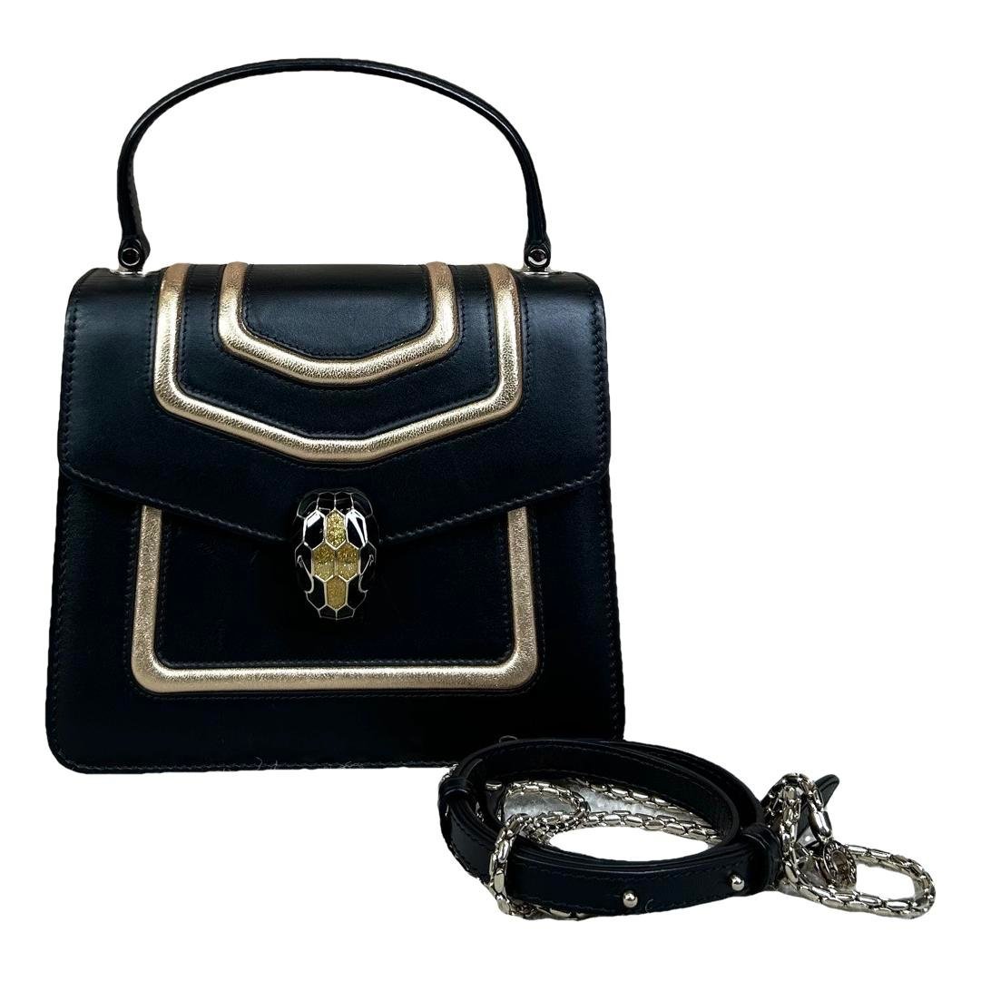 Serpenti leather handbag