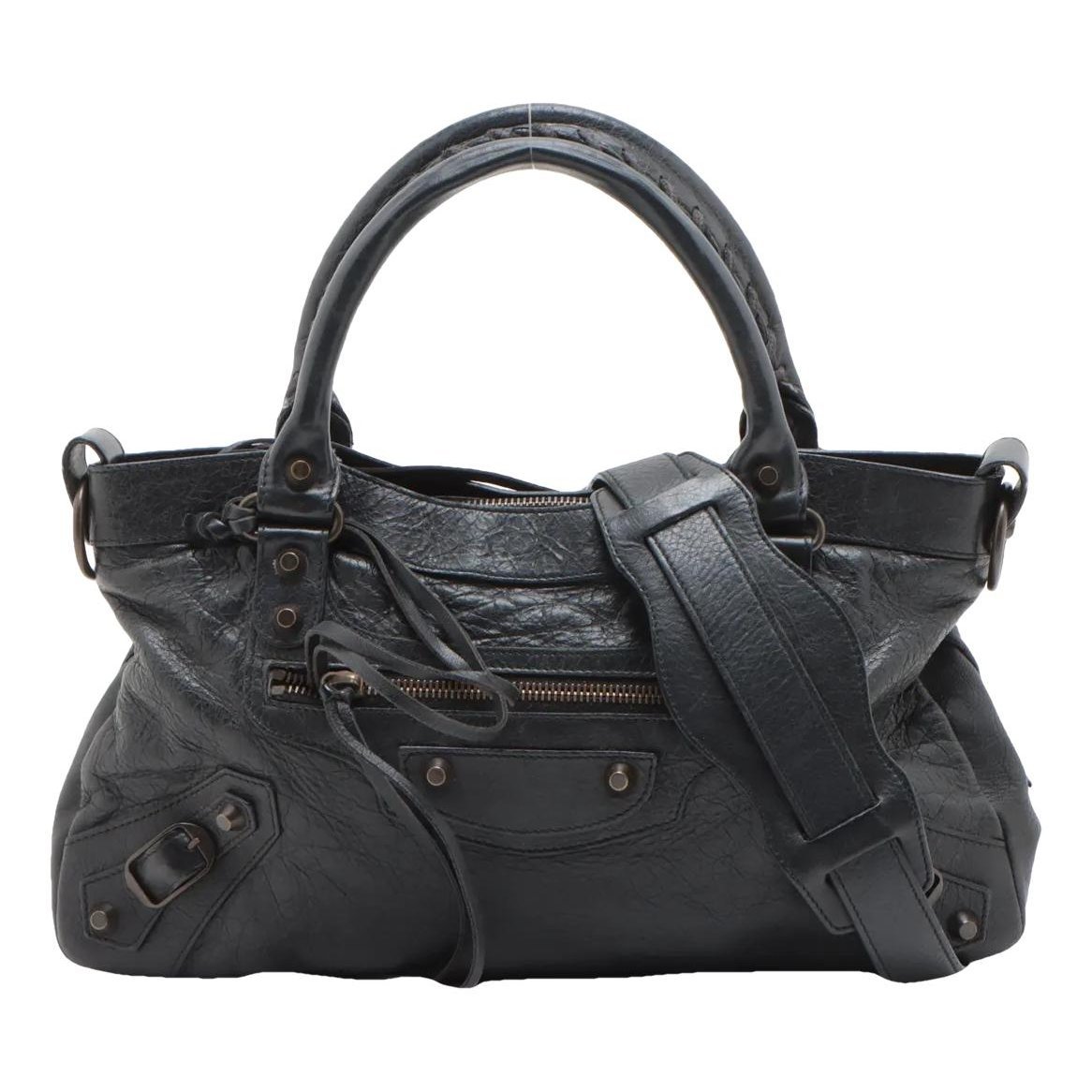 First leather handbag