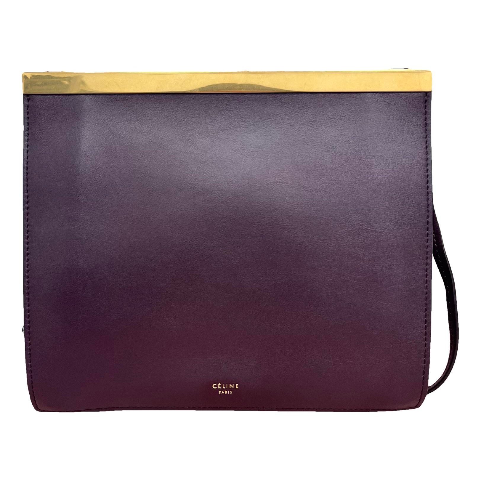 Clasp leather handbag