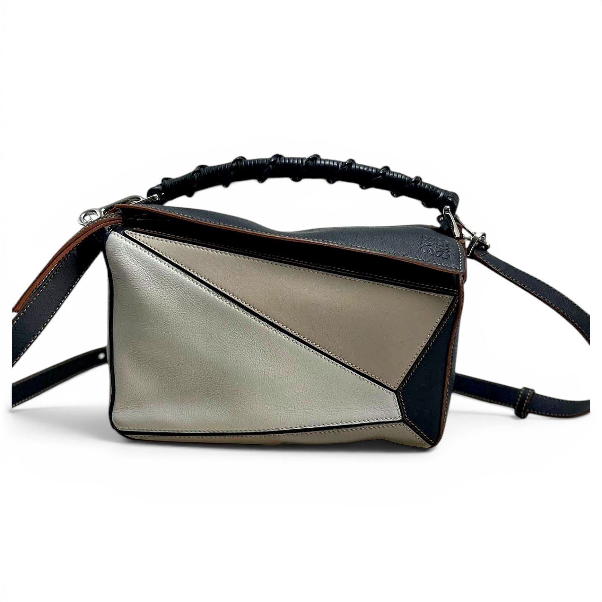 Puzzle leather handbag