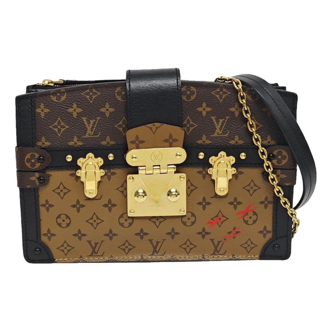 Pochette Trunk cloth handbag