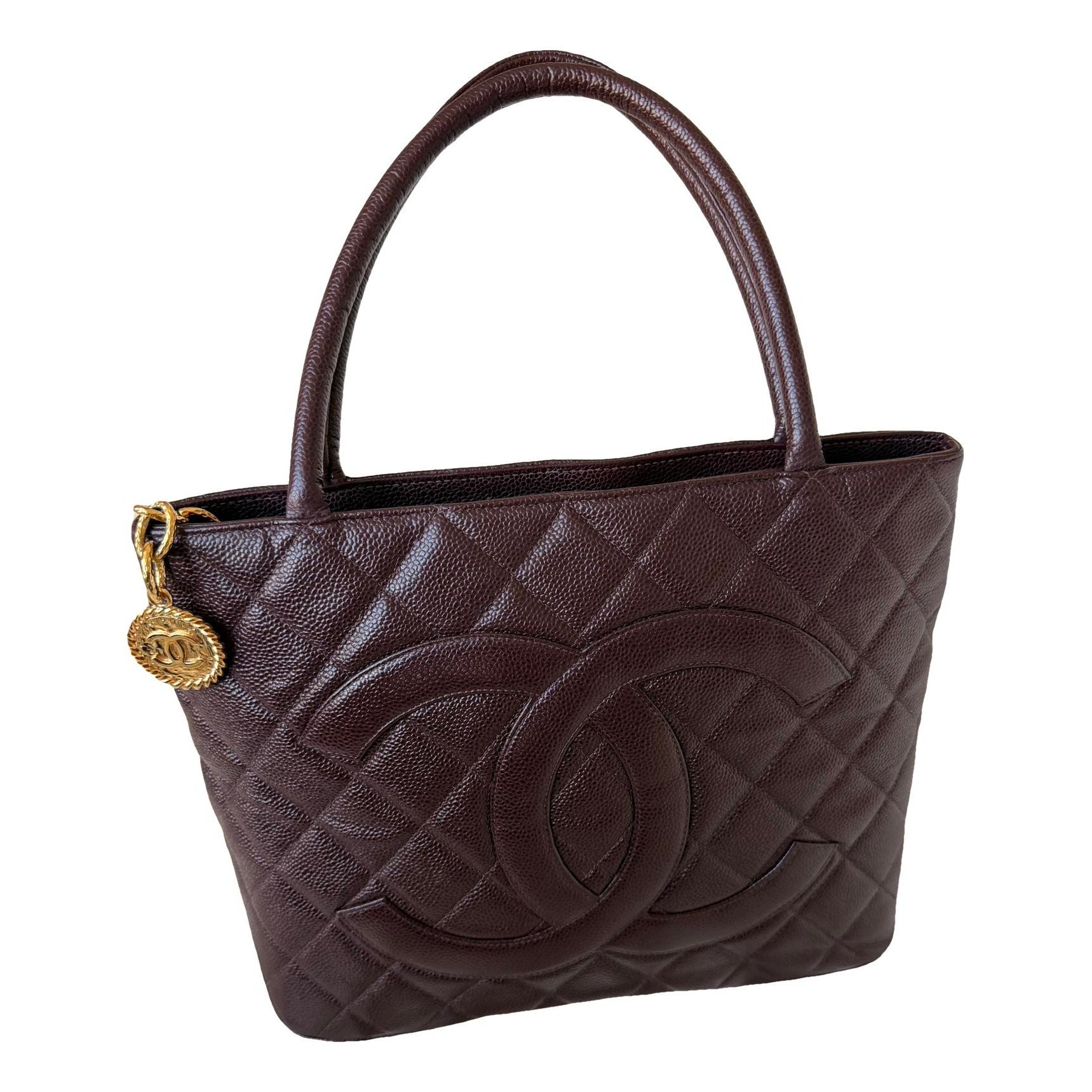 Médaillon leather handbag