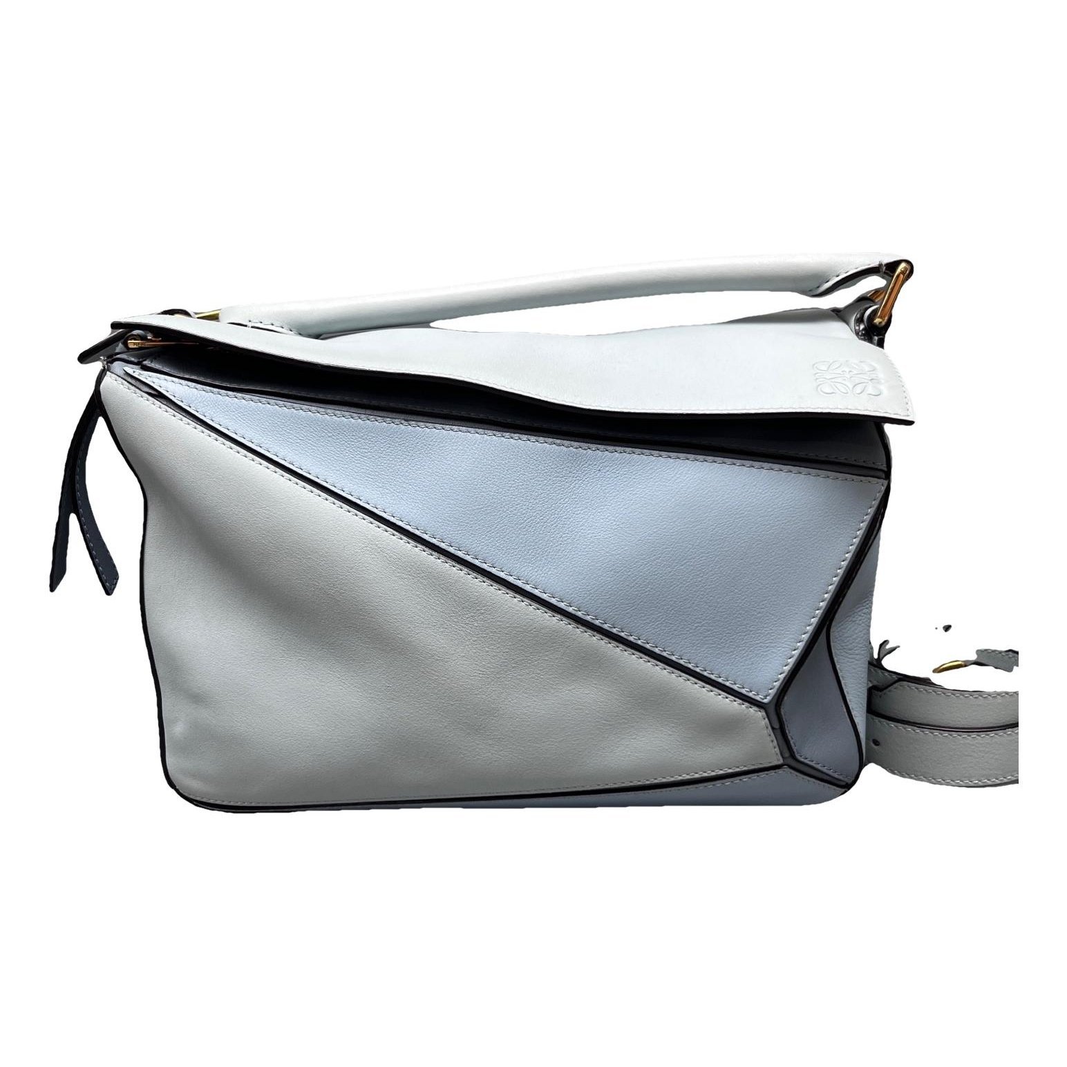 Puzzle leather handbag