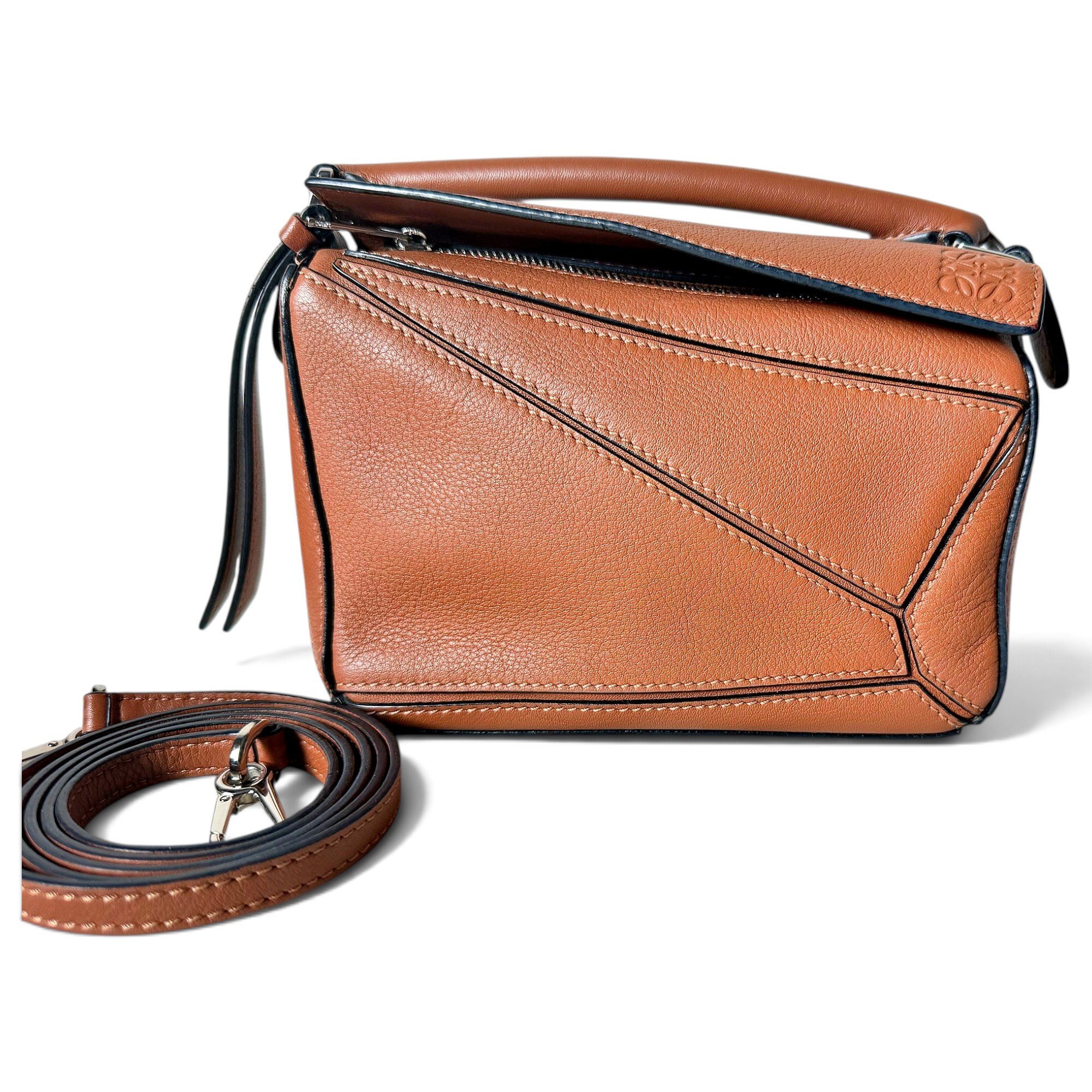 Puzzle leather crossbody bag