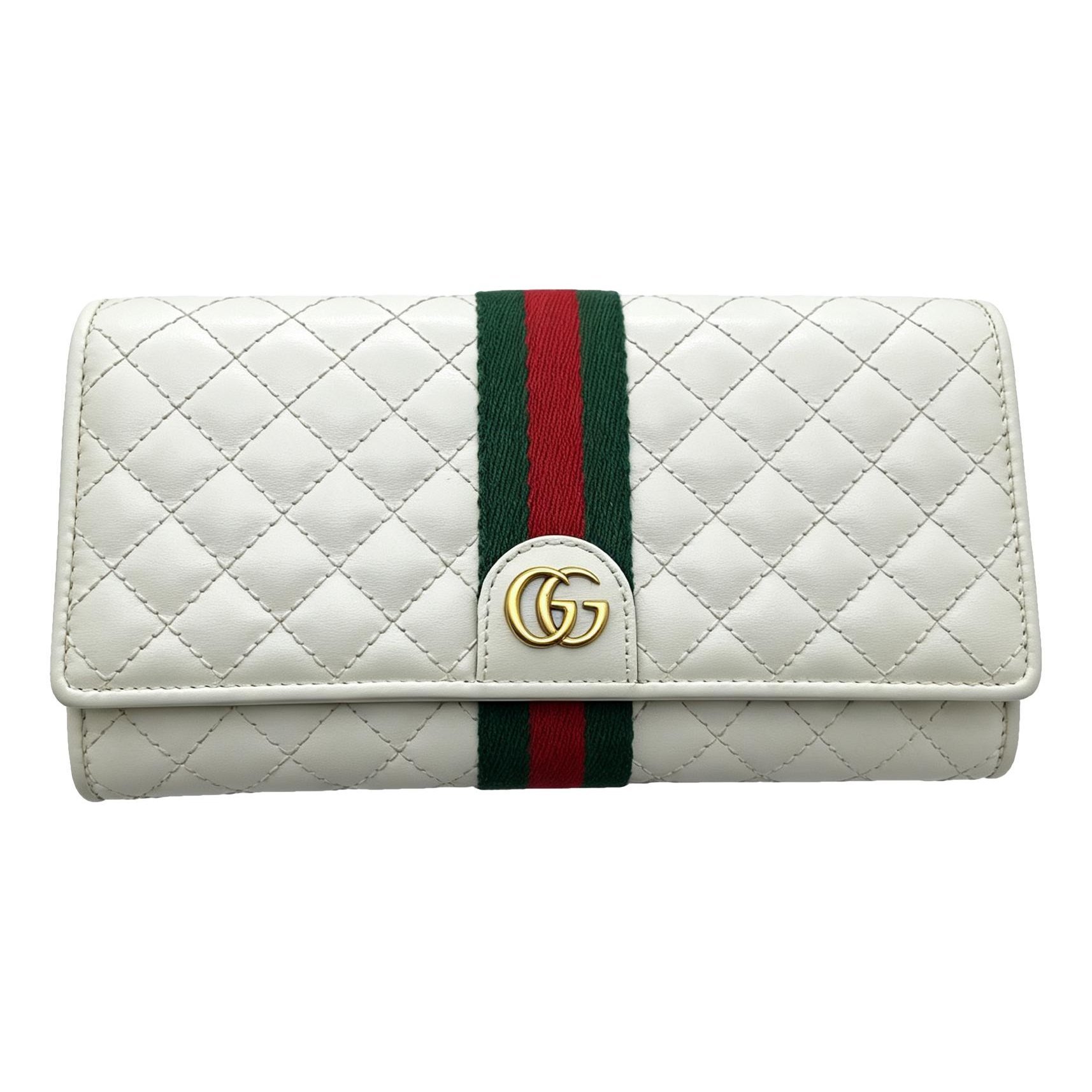 Ophidia leather clutch bag