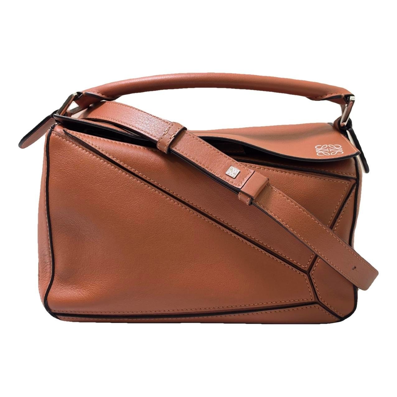 Puzzle leather handbag