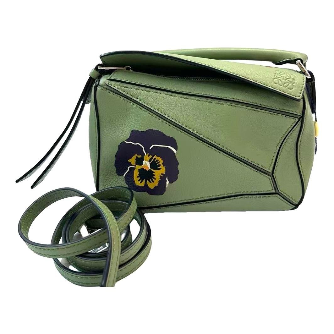Puzzle leather handbag