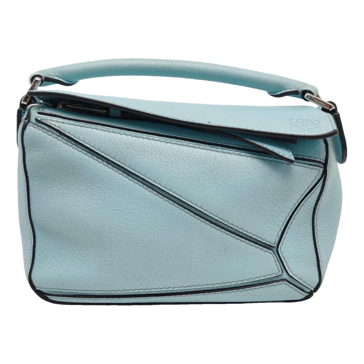 Puzzle leather handbag