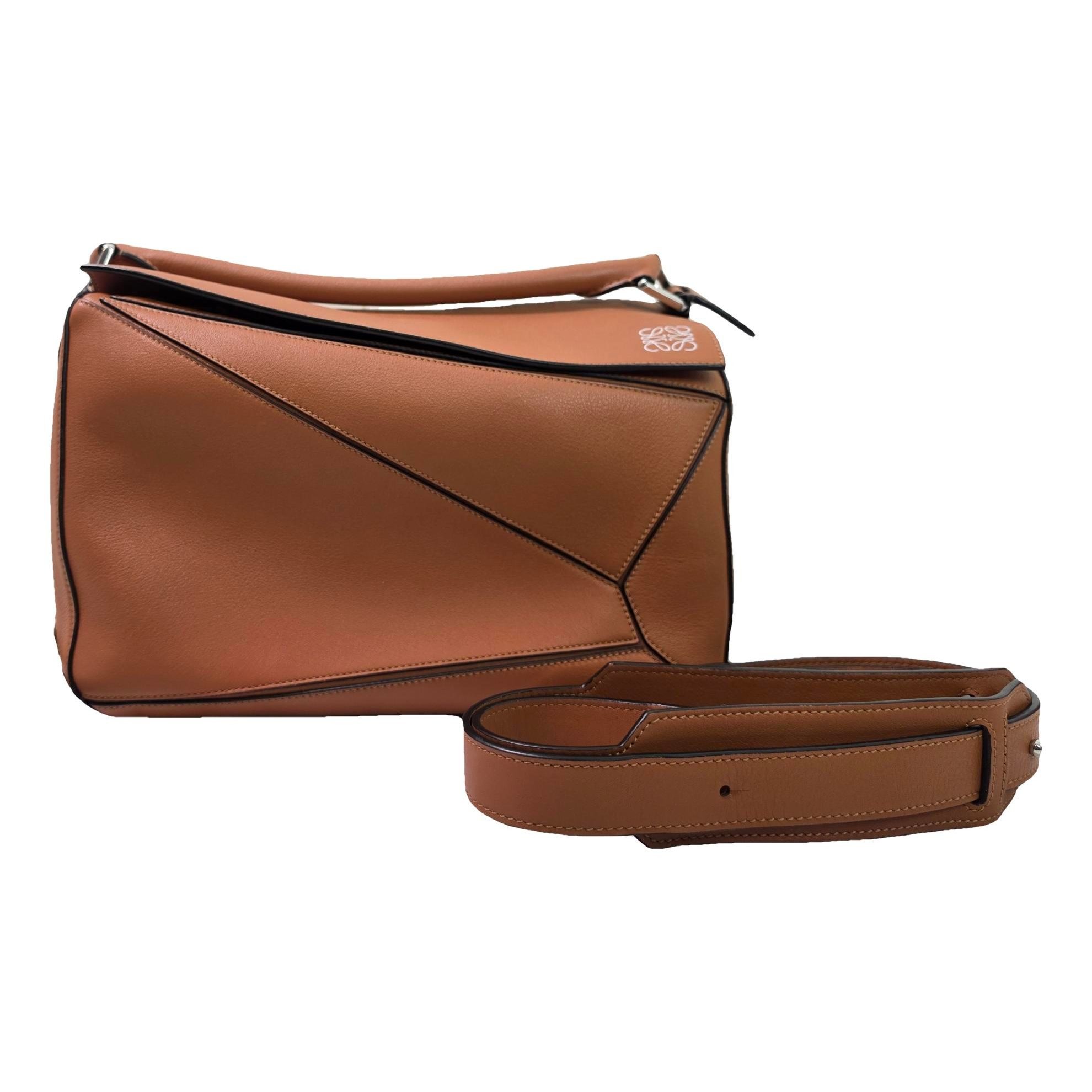 Puzzle leather handbag