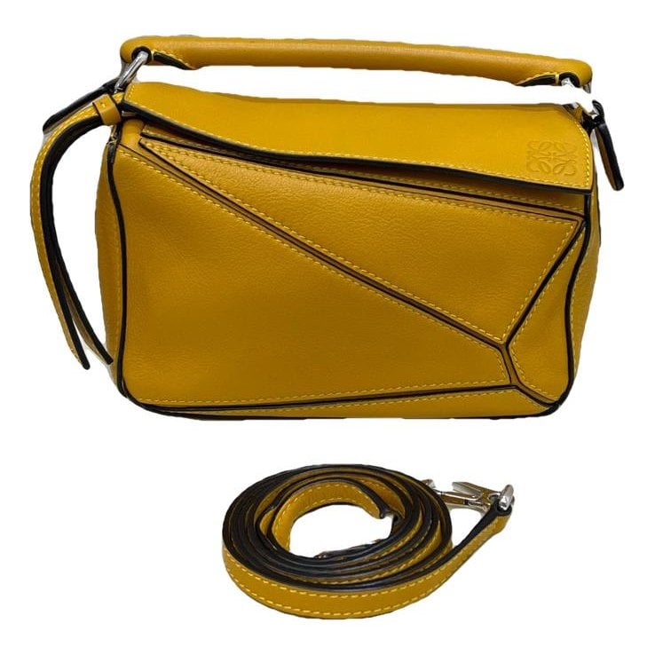 Puzzle leather handbag
