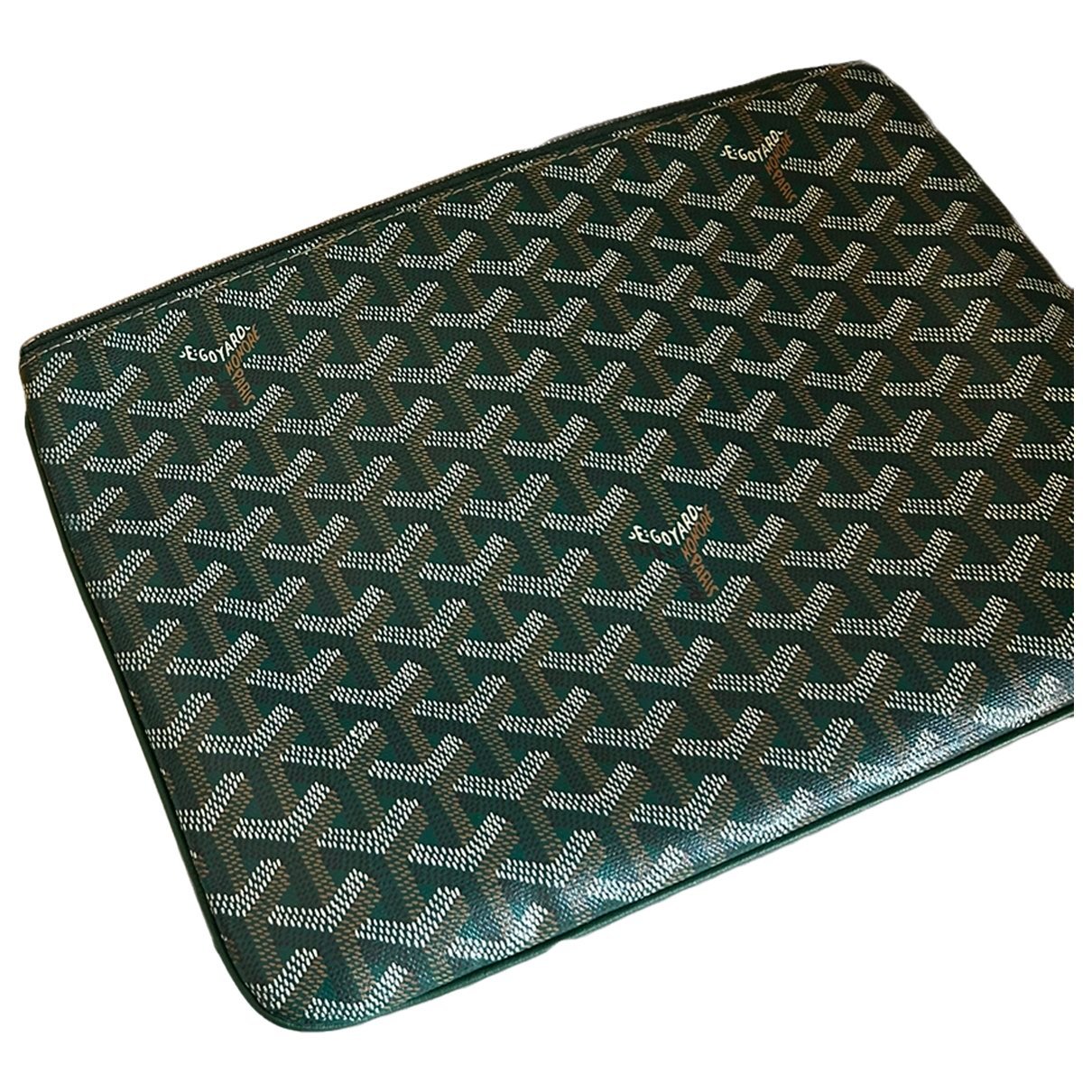 Sénat patent leather clutch bag