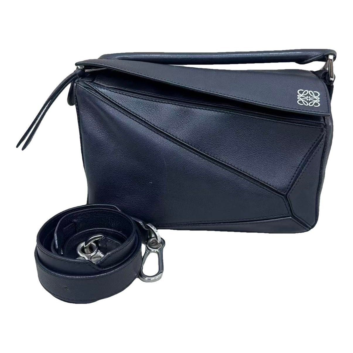 Puzzle leather handbag