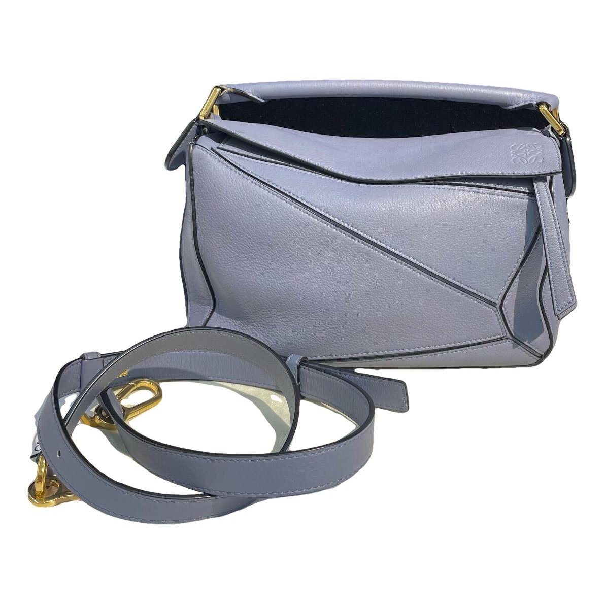 Puzzle leather handbag