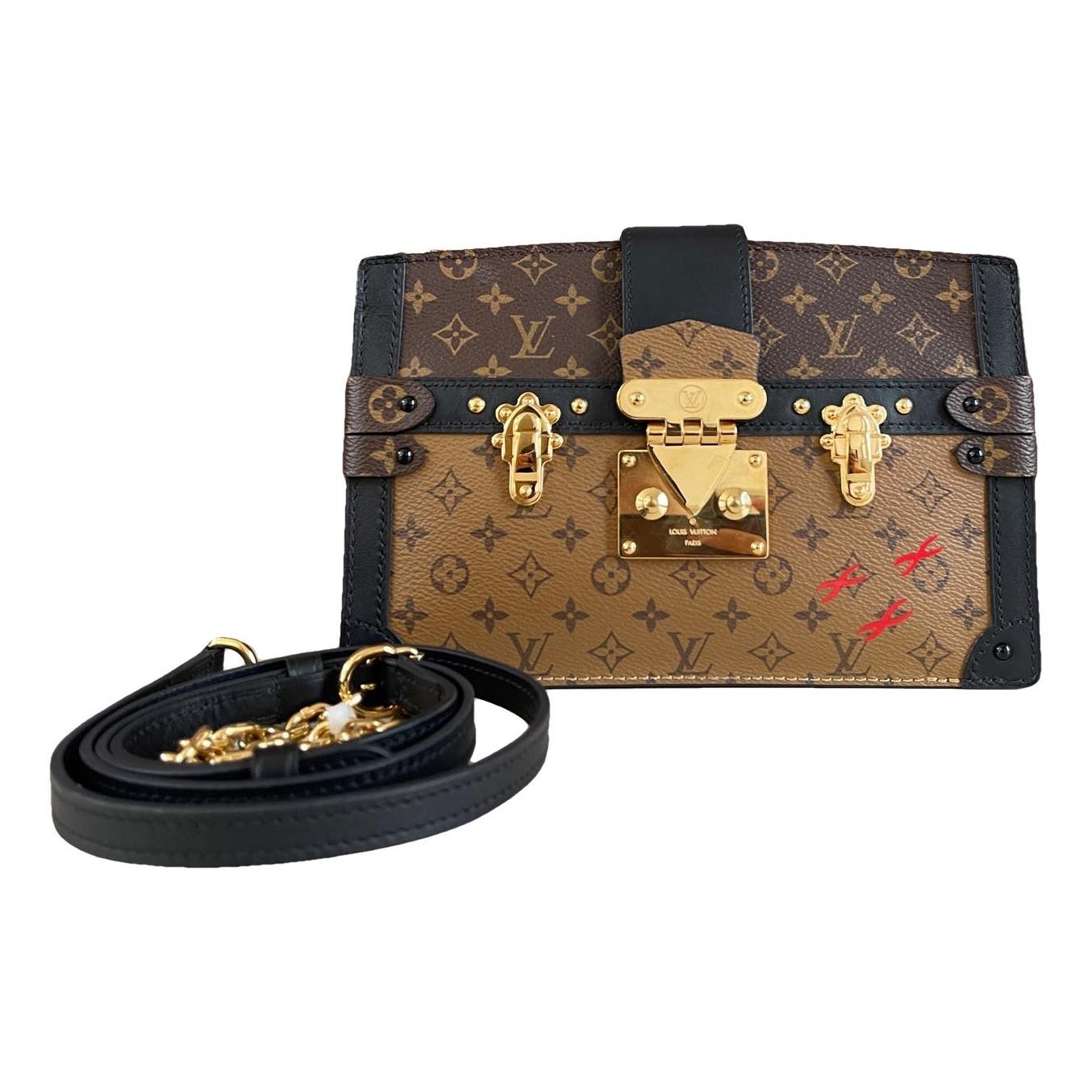 Pochette Trunk leather handbag